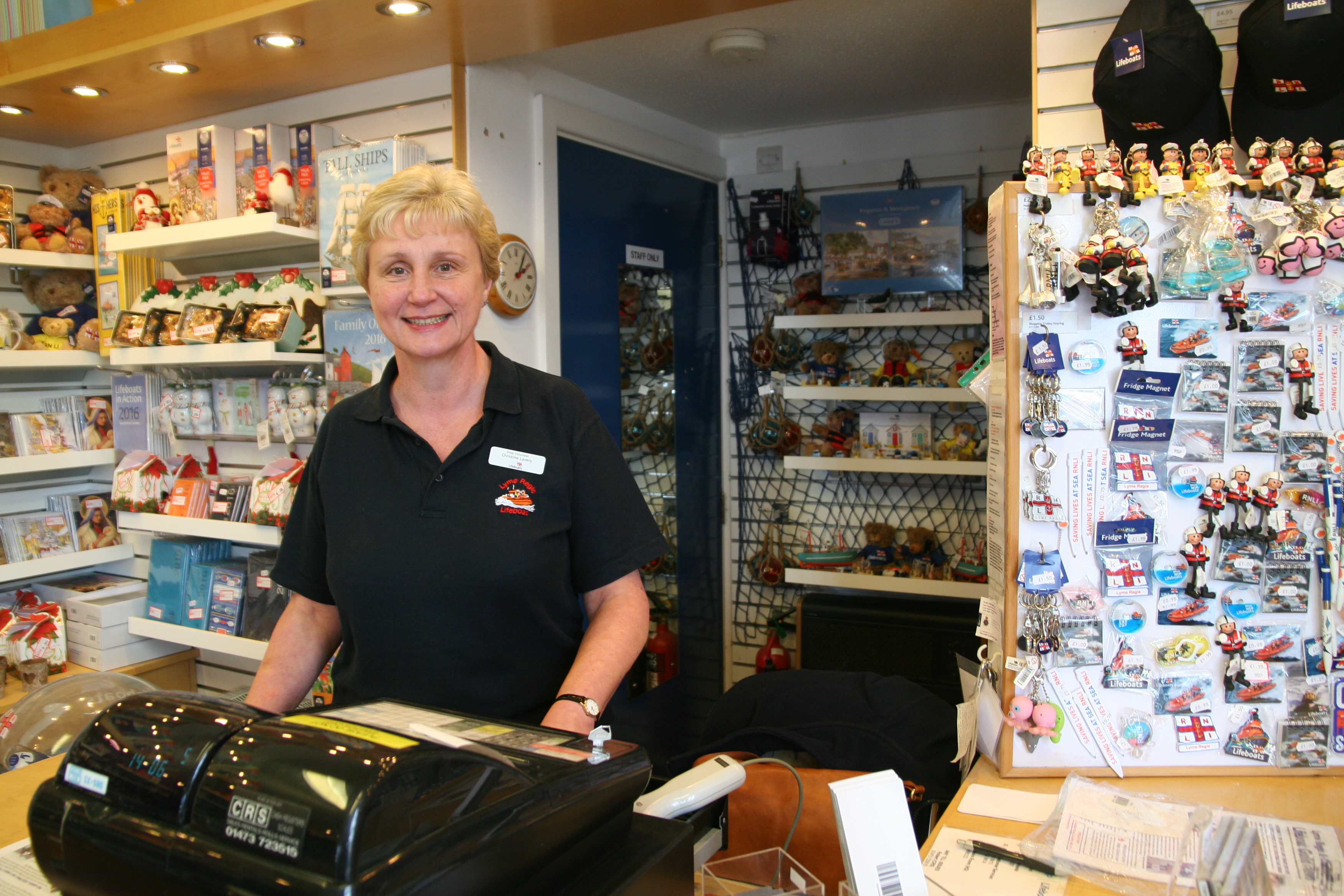 Photo of woman in the in RNLI gift shop