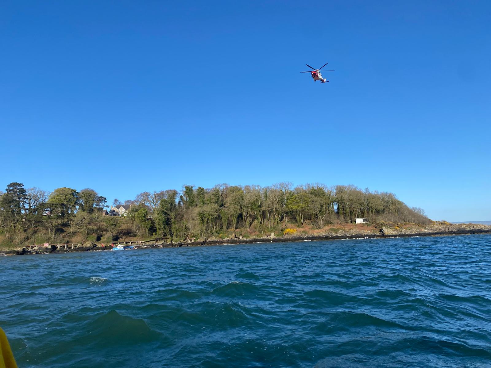 Rescue 199 overlooking sinking fishing boat