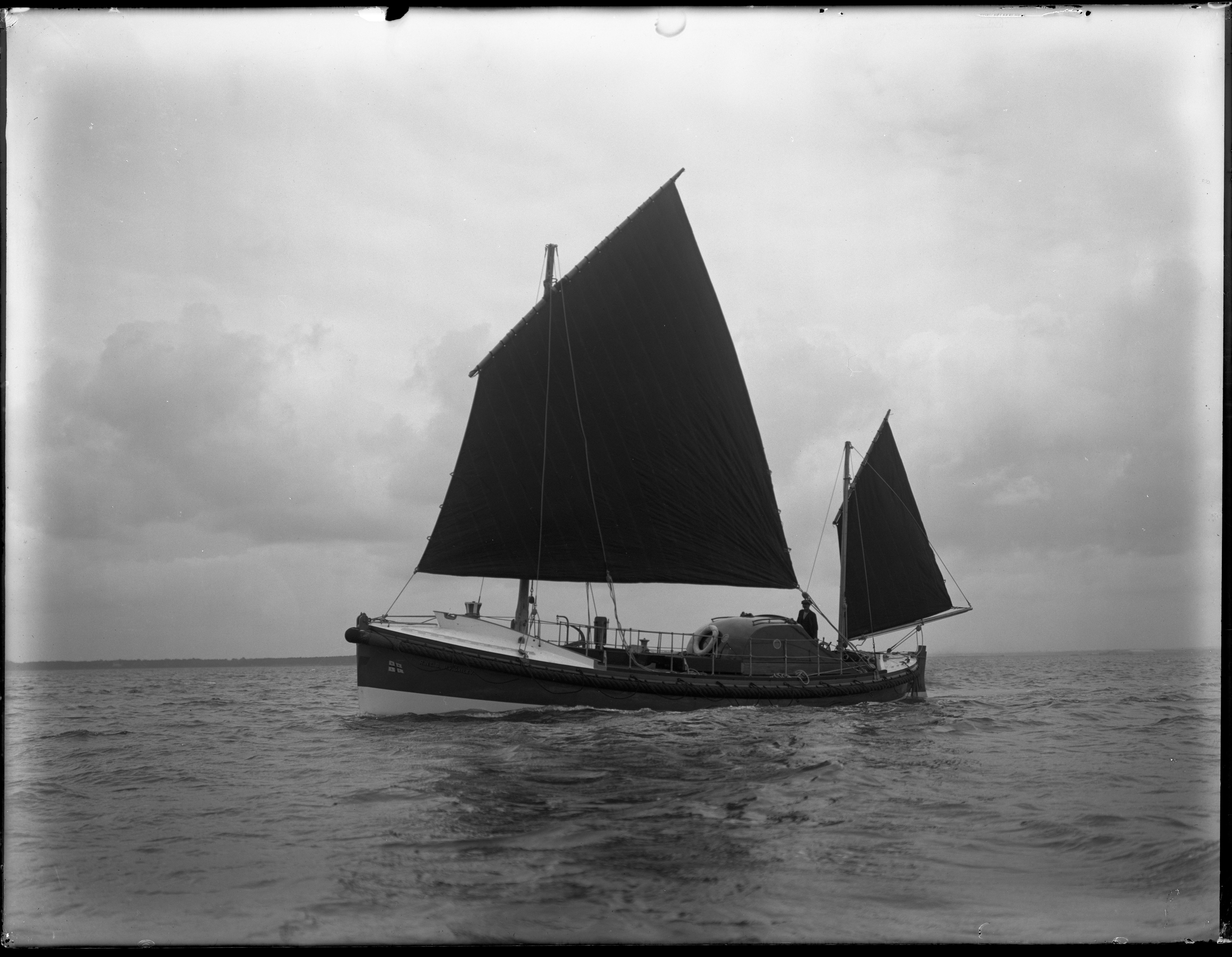 Cromer RNLI Lifeboat Waverley H F Bailey II ON714 on open water with sails up