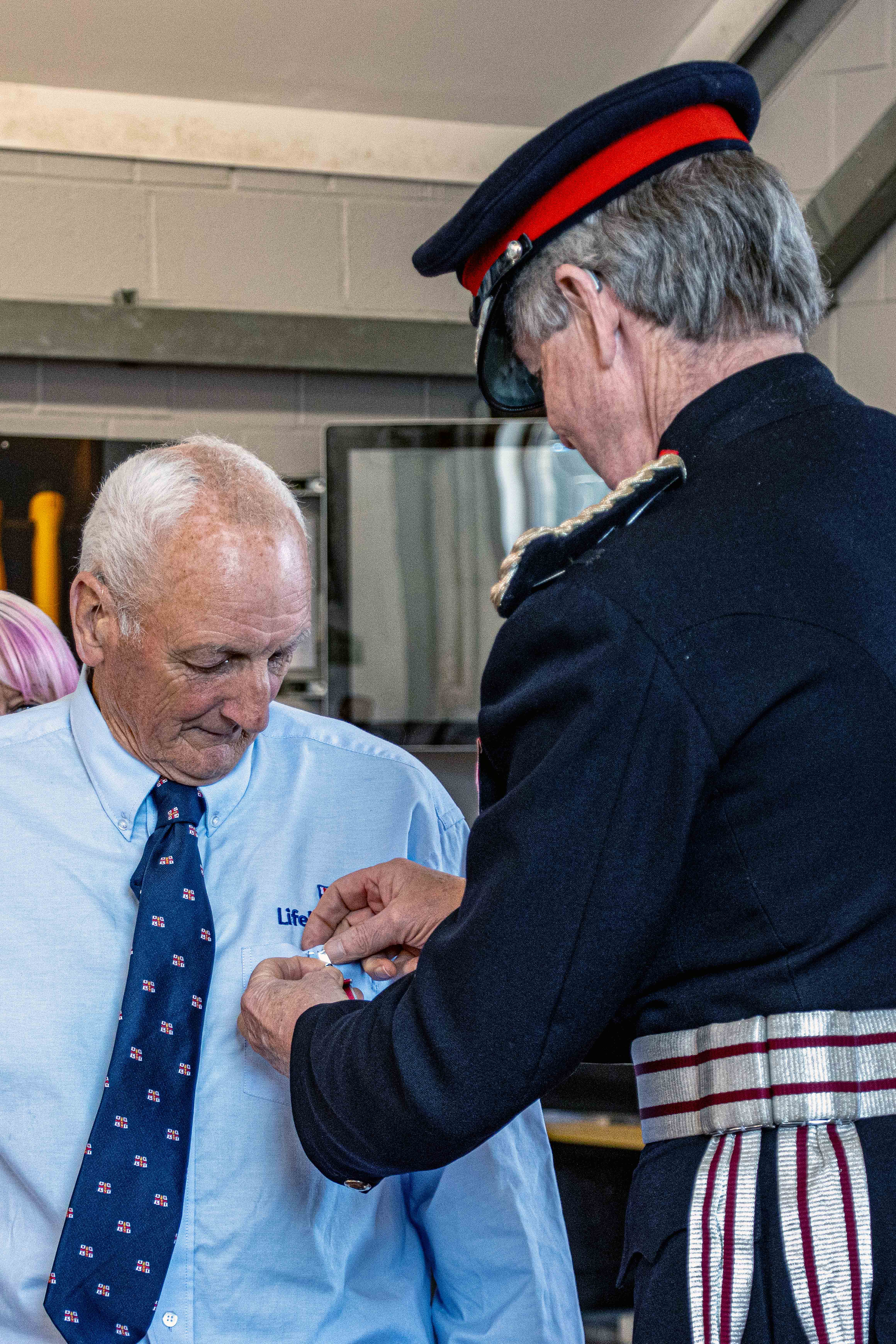 David Haines receiving his British Empire Medal from the Lord Lieutenant of Cornwall Colonel Sir Edward Bolitho