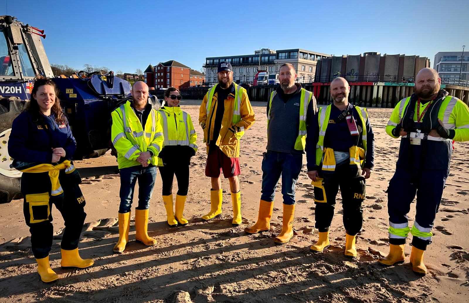 A group shot on New Brighton beach of the shore crew for the rescue. 