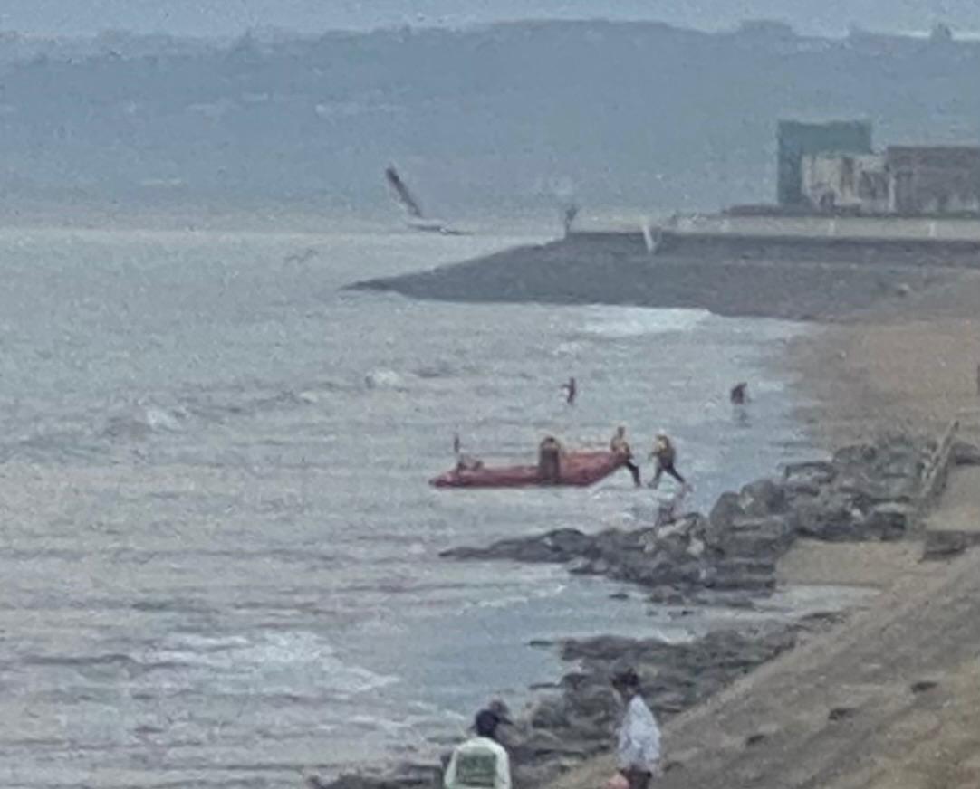 Port Talbot RNLI arrive on scene to a swimmer reported to be having a seizure