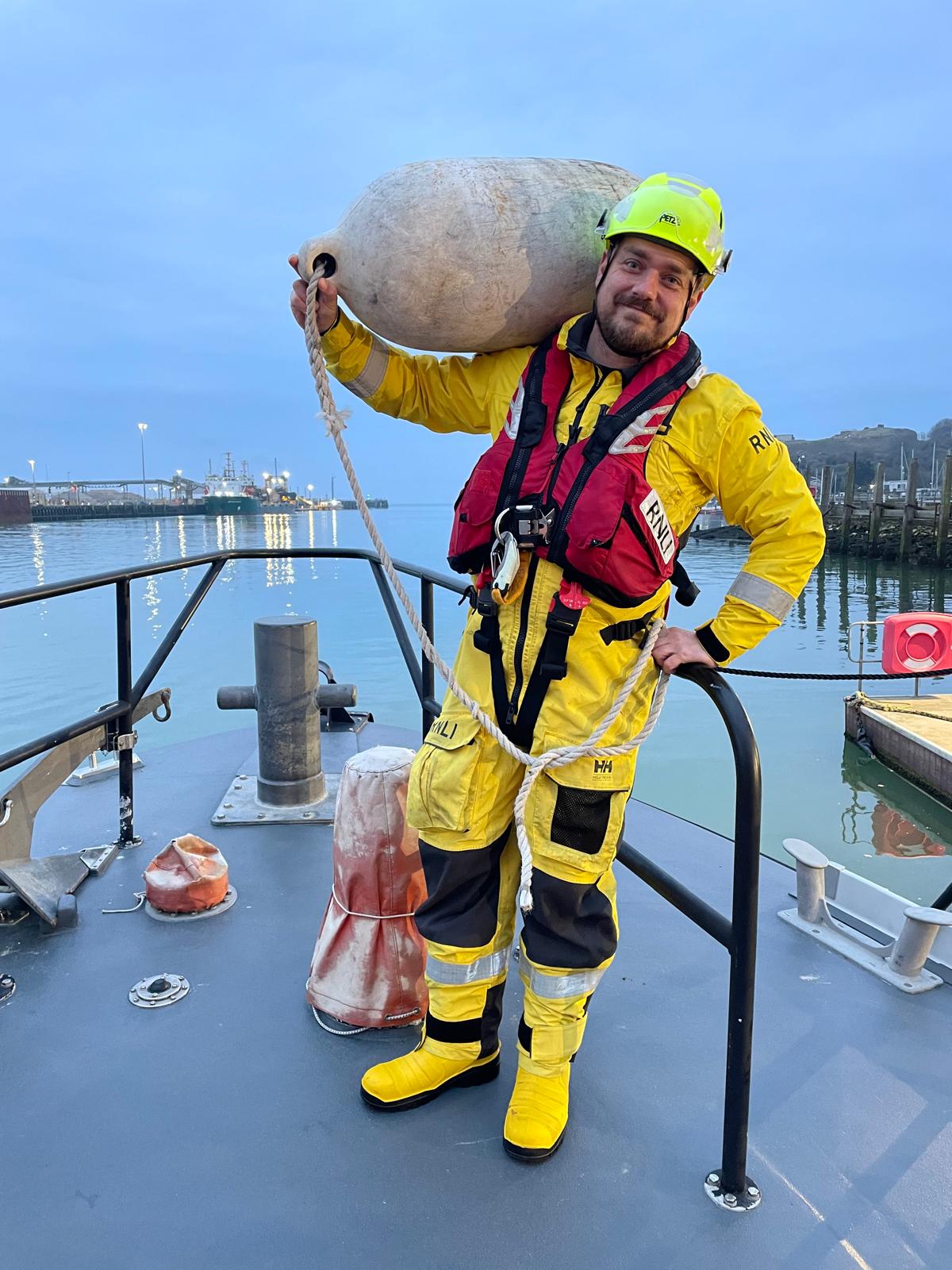 Volunteer crew member Will Rowell with a fender
