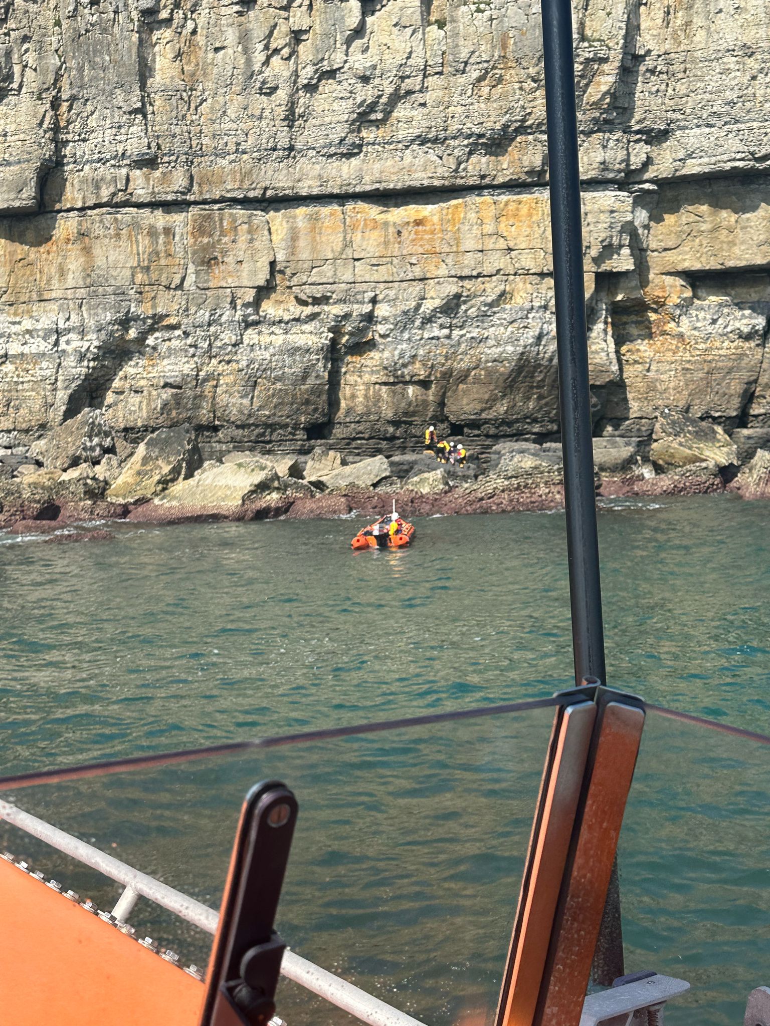 Swanage ILB and ALB on scene near Anvil Point to assist an injured climber.