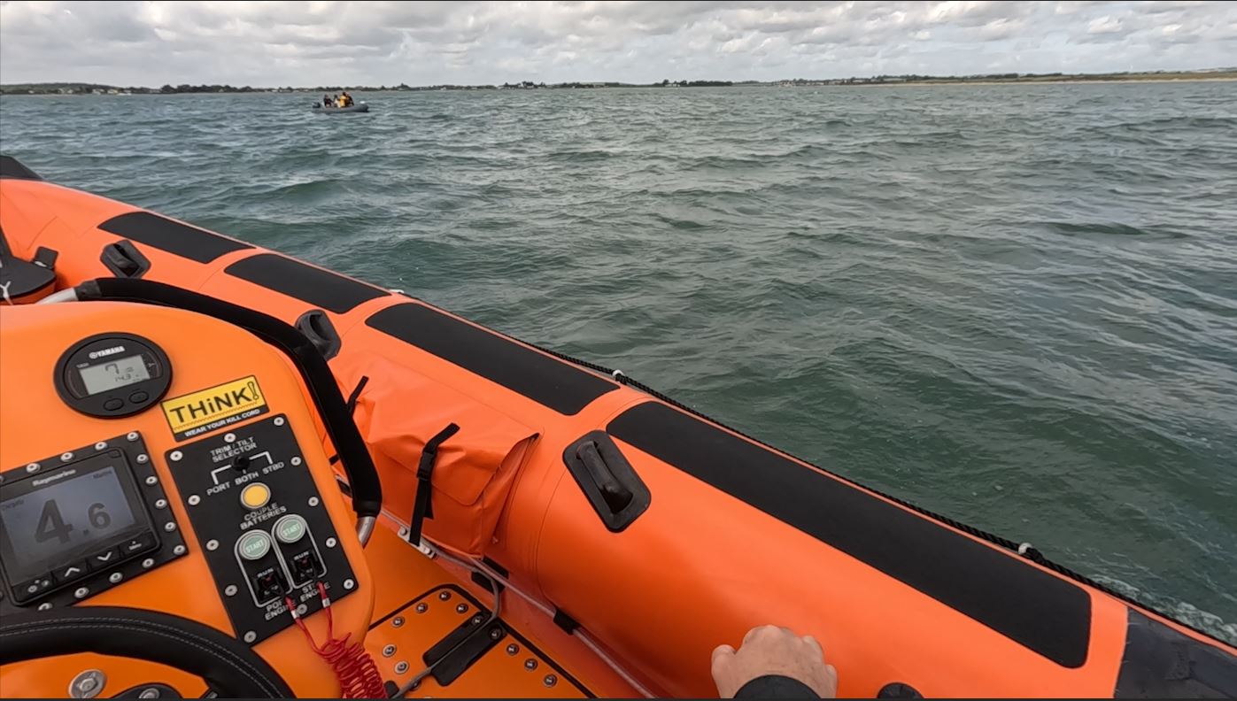 Skerries RNLI volunteers making their way ashore
