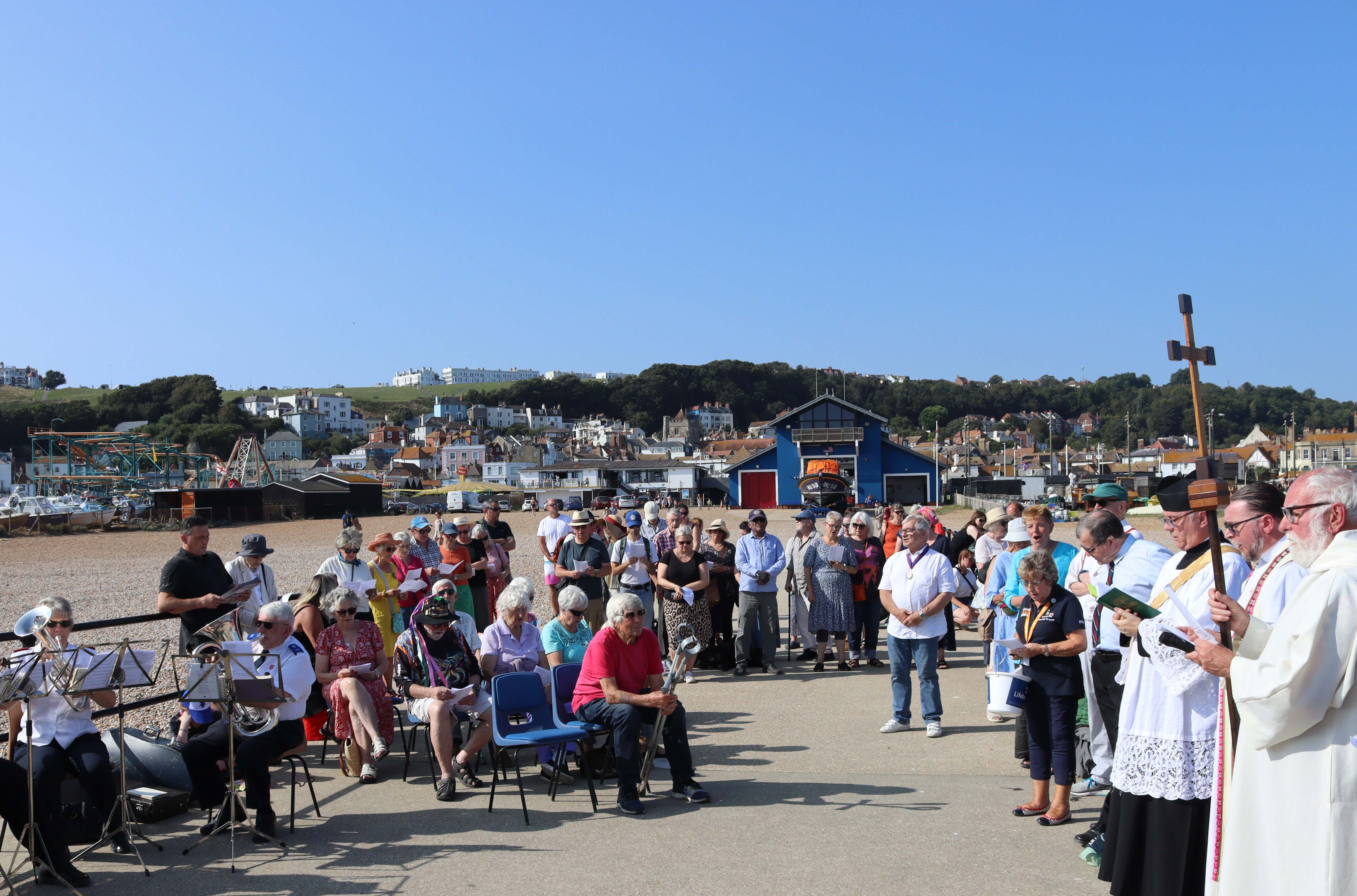 General view of the service on the harbour arm, with the lifeboat house and lifeboat in the background