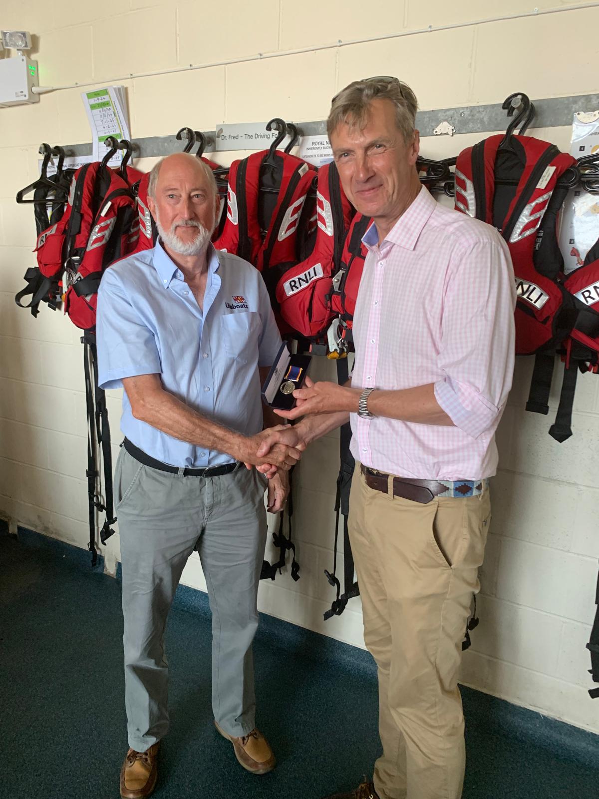 John Smerkivich being present long service award for 20 years by Peter Sparkes