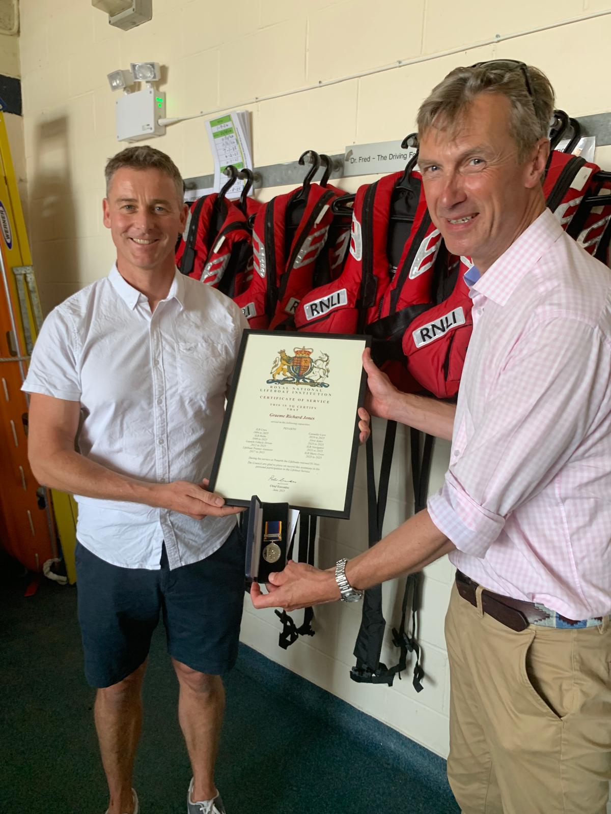 Pikey receiving his ward for 30 years service from Peter Sparkes