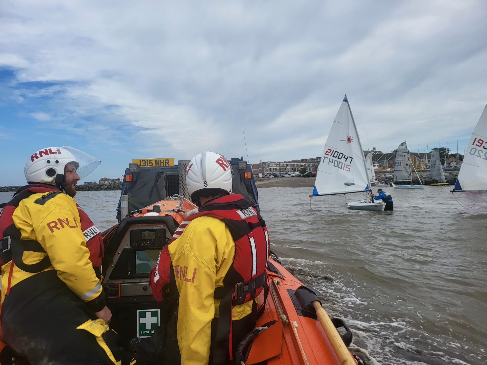 The D class can be seen recovering onto the BV launch vehicle while sailing boats can be seen in the background on the tide.
