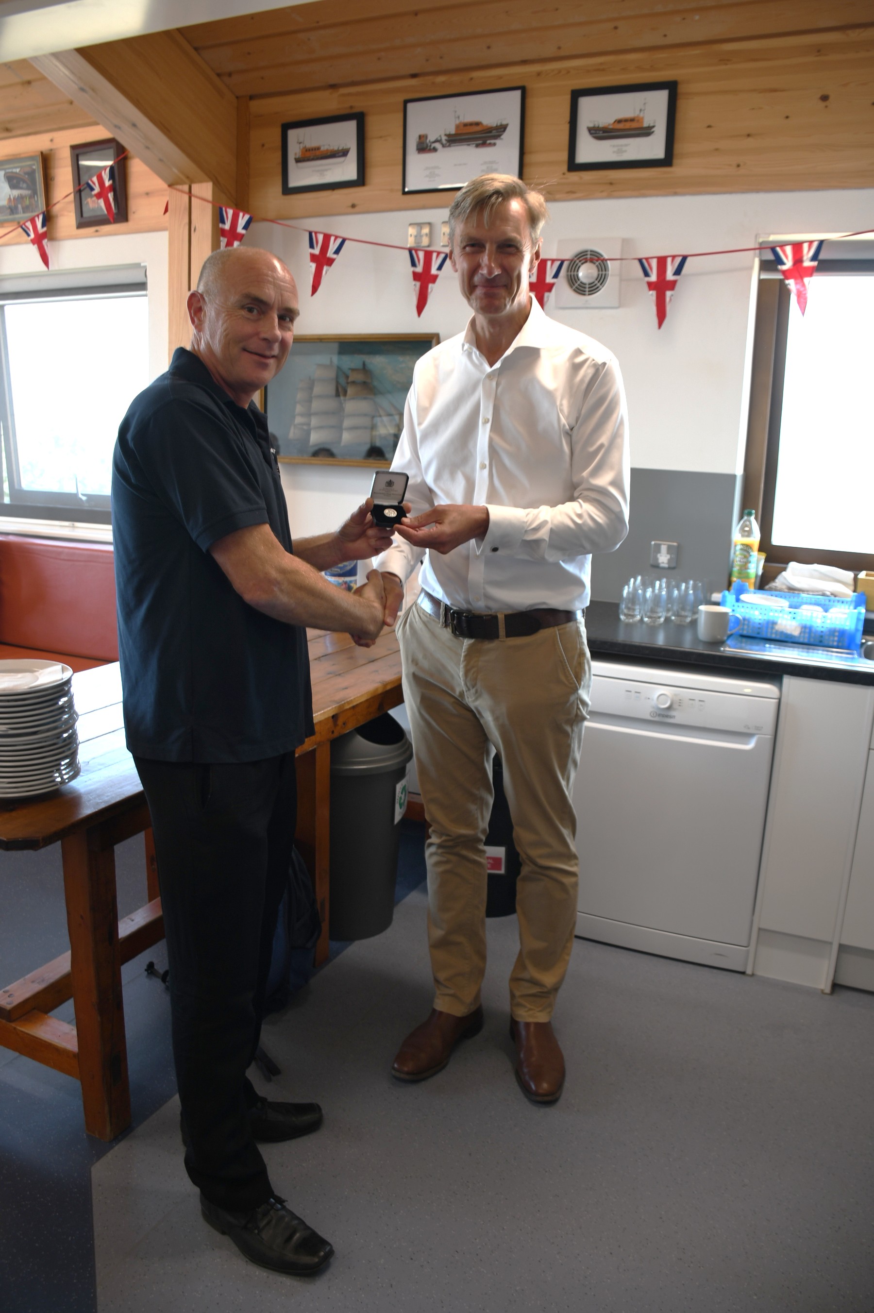 RNLI Chief Executive Peter Sparkes presenting James Betteridge's 20 years service award