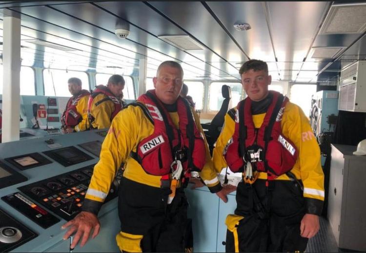 Father and son Alan and Rian Kelly from Helvick Head RNLI pictured in lifeboat kit