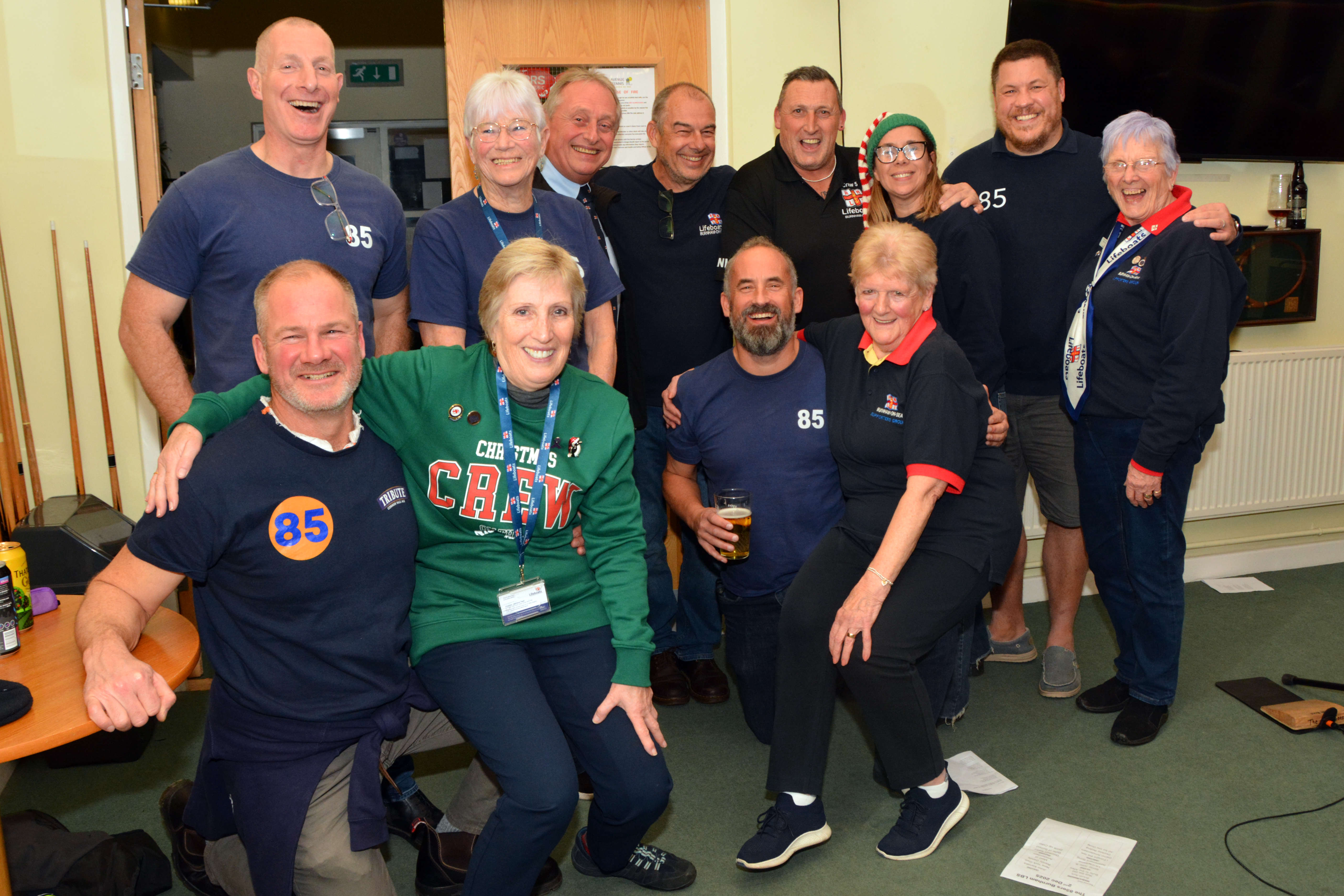 The 85ers, with fundraising volunteers, during the comfort break, mid-evening.