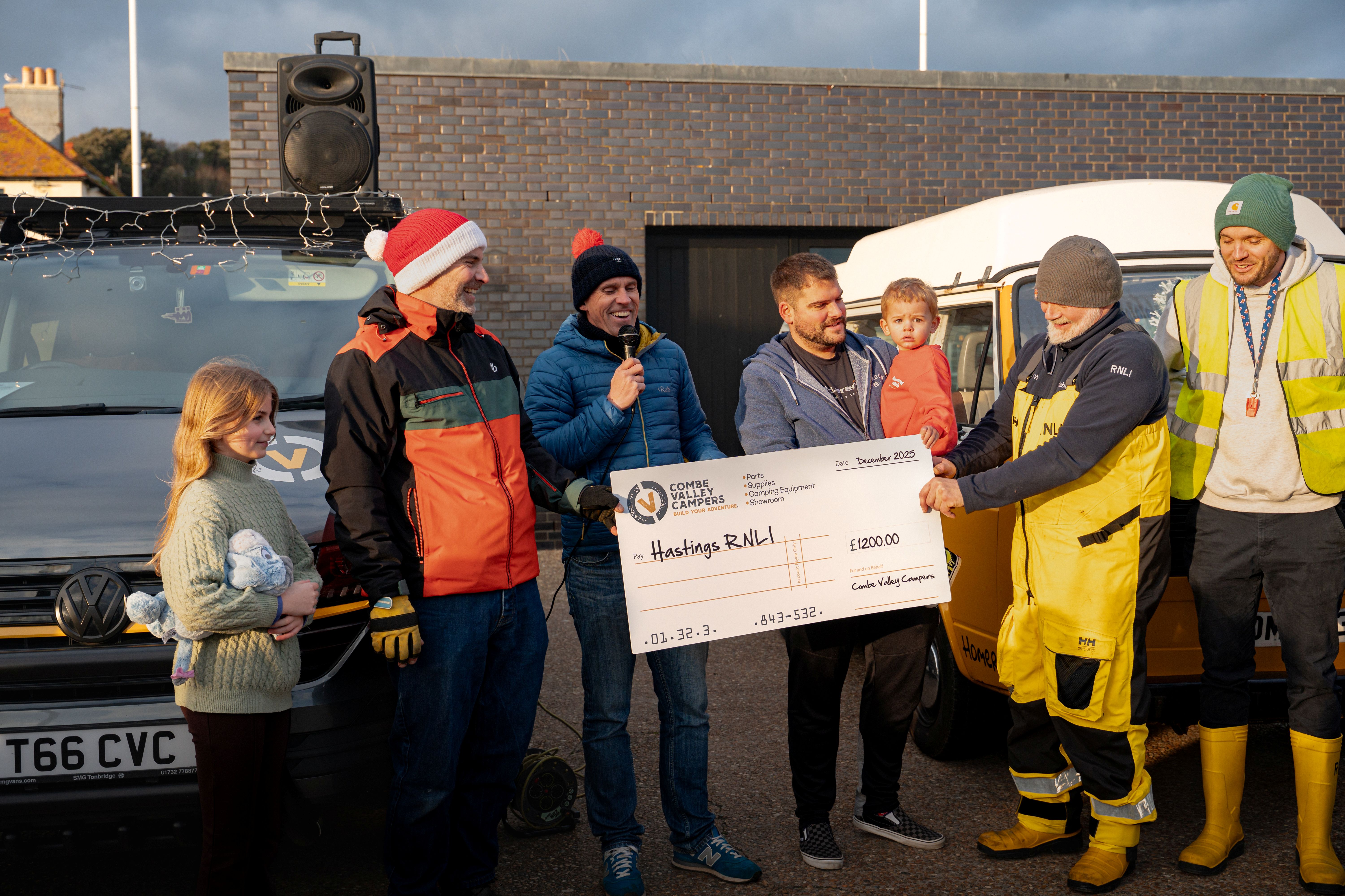 Large cheque presentation from Combe Valley campers to Hastings RNLI coxswain Paul McCleery