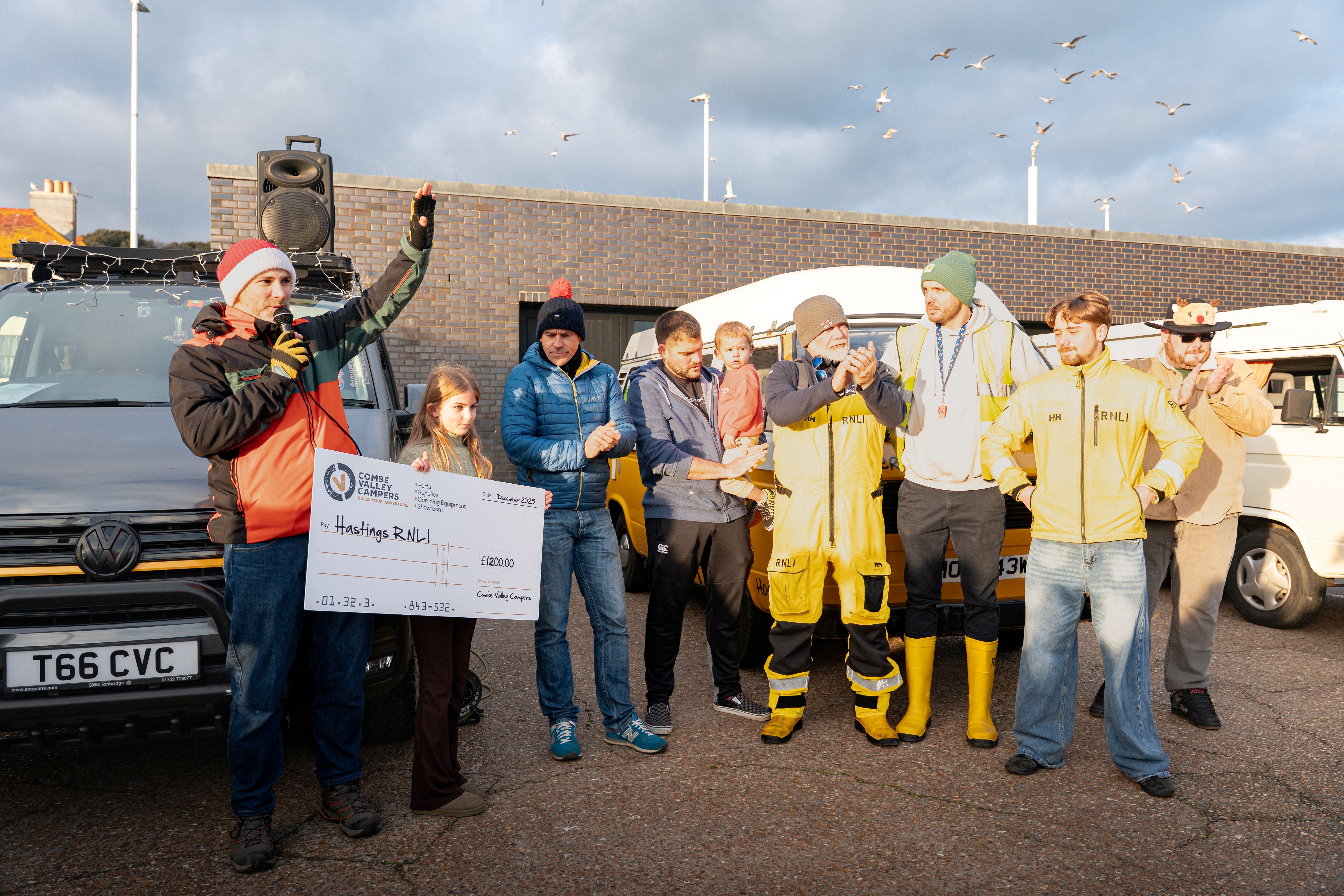 Large cheque presentation from Combe Valley campers to Hastings RNLI coxswain Paul McCleery