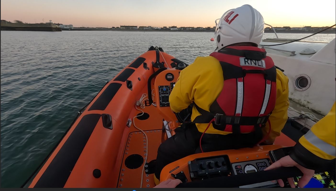 Skerries RNLI towing one of the vessels into Skerries Harbour