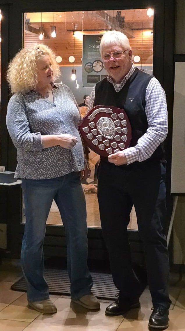Simon Tibble receiving the Kelvin Baker Achievement award