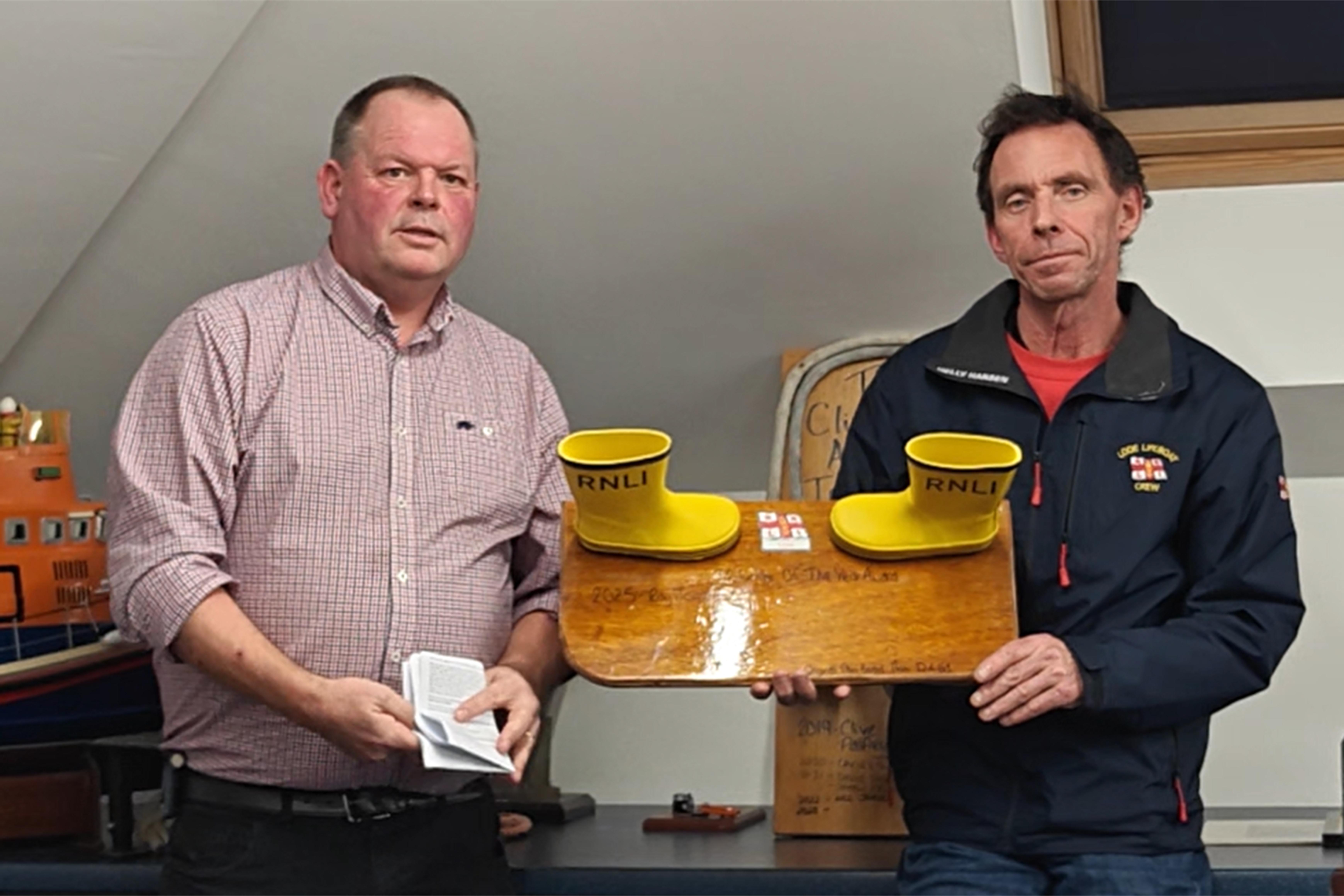 Clive Palfrey and Brain Bowdler with the volunteer of the year award