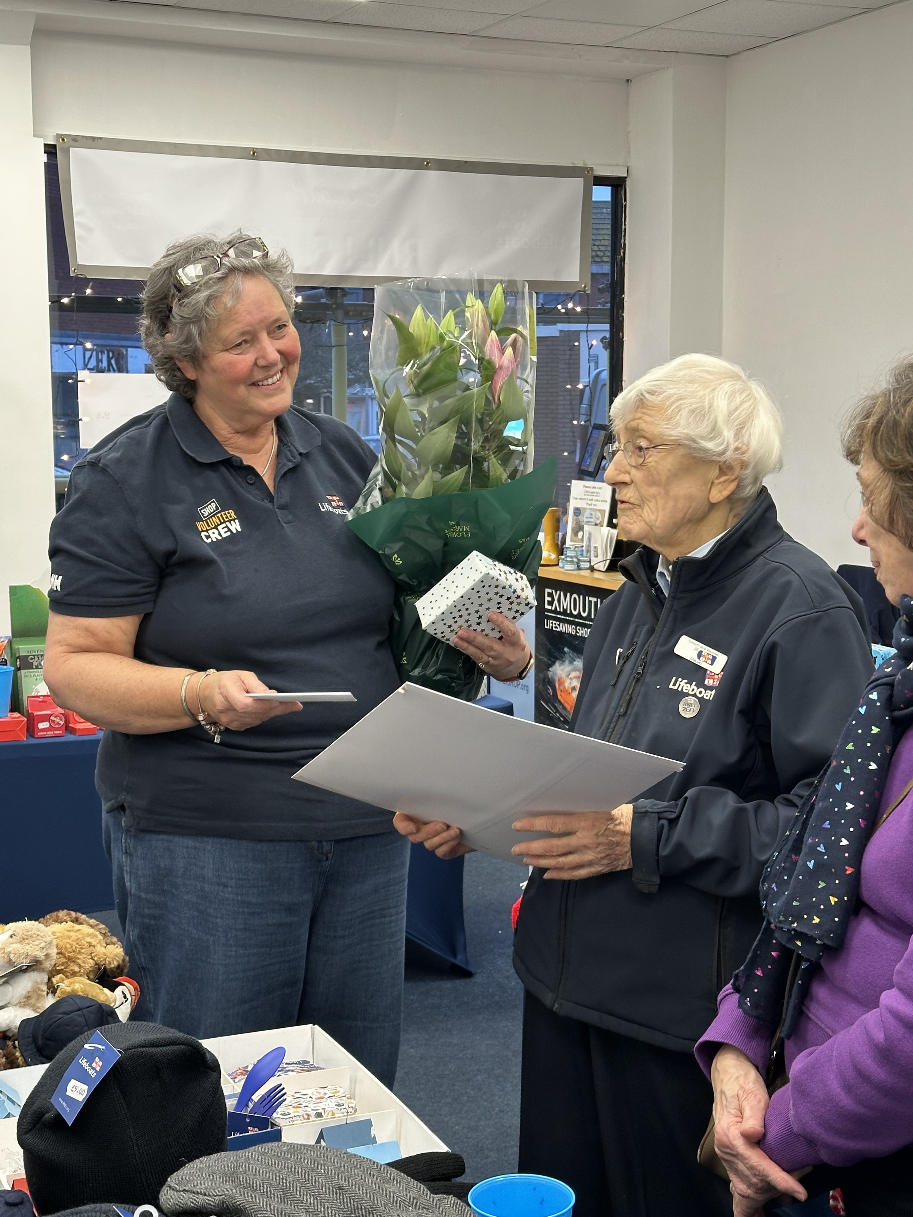 Presentation to Jill Carter by Alison Gall, Exmouth RNLI Shop Manager