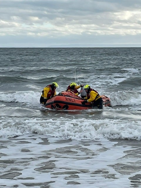 Crew recovering lifeboat