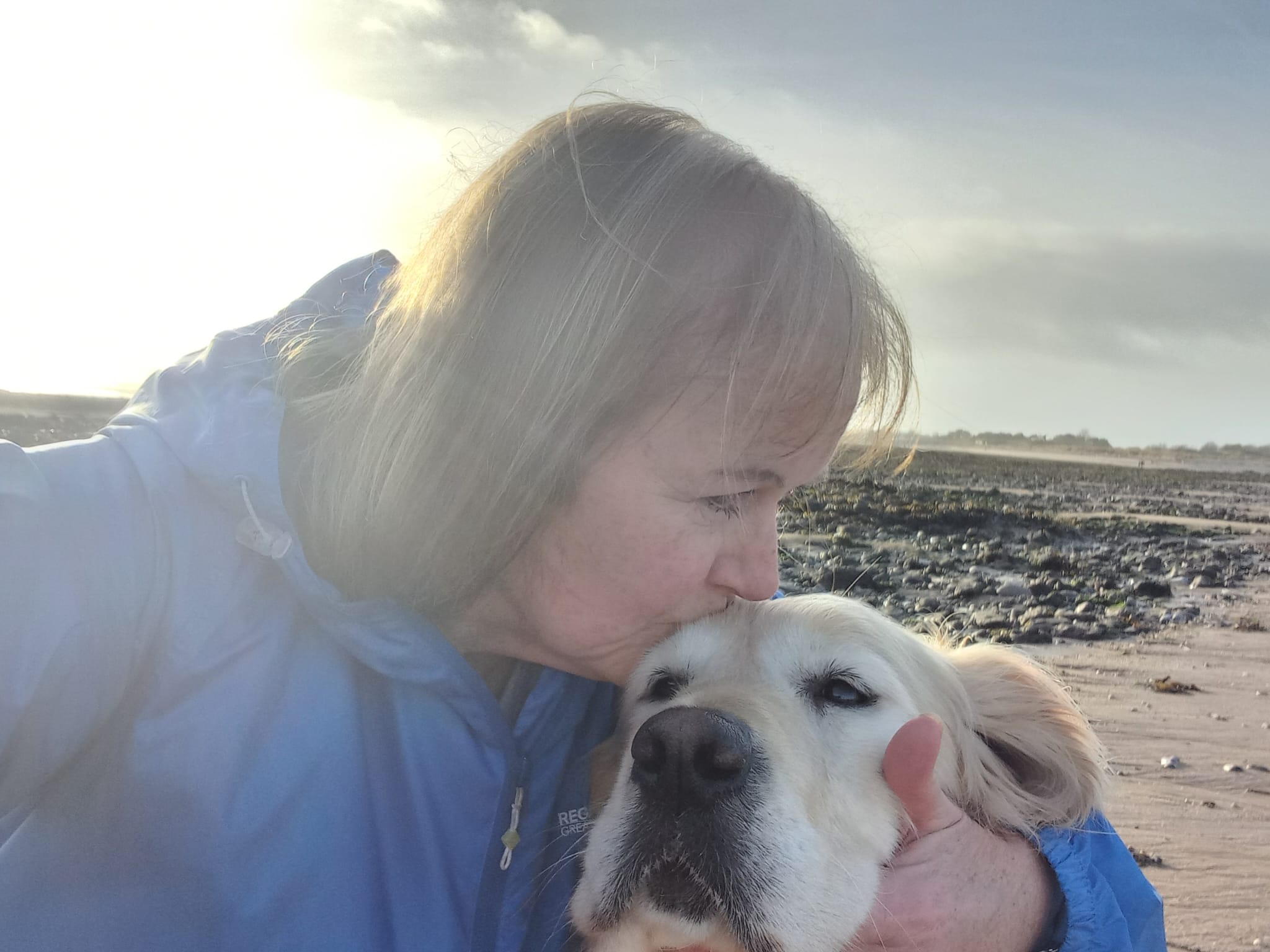 Andrea kissing Seren's head