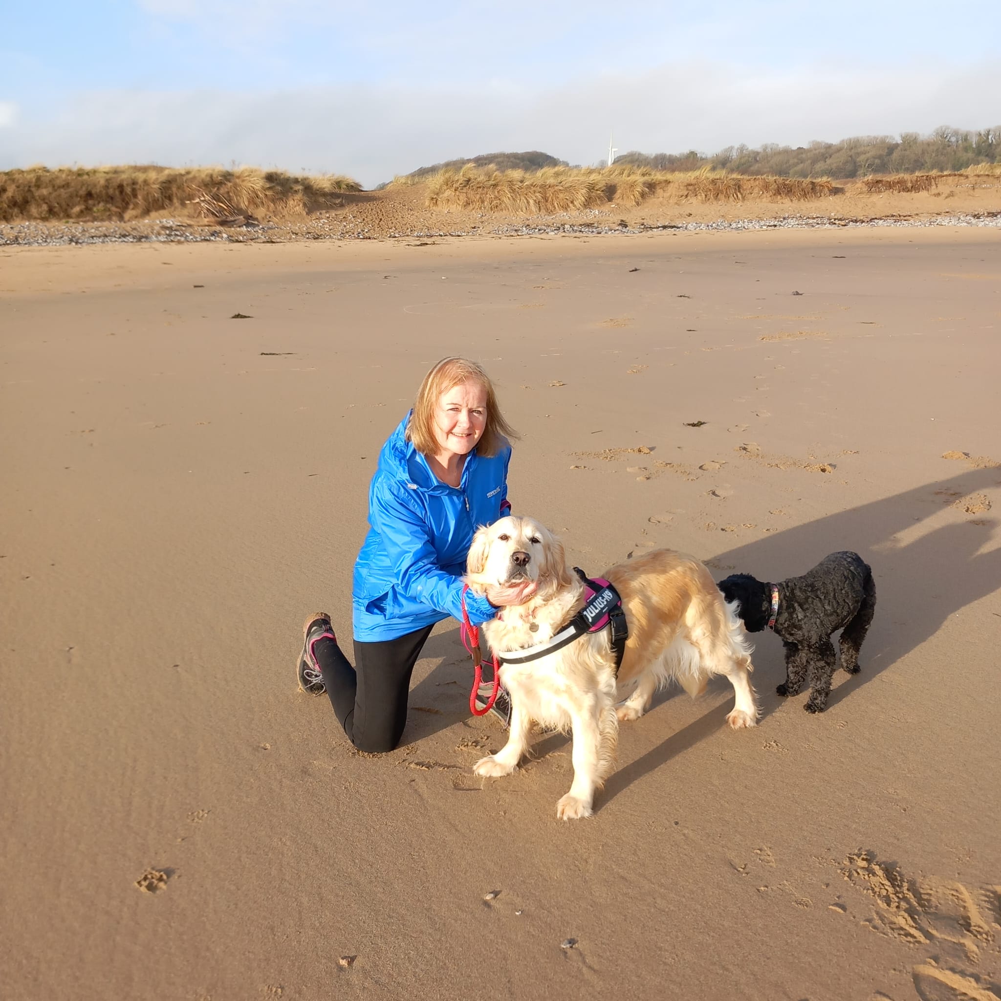 Andrea with Seren and her other dog at the beach