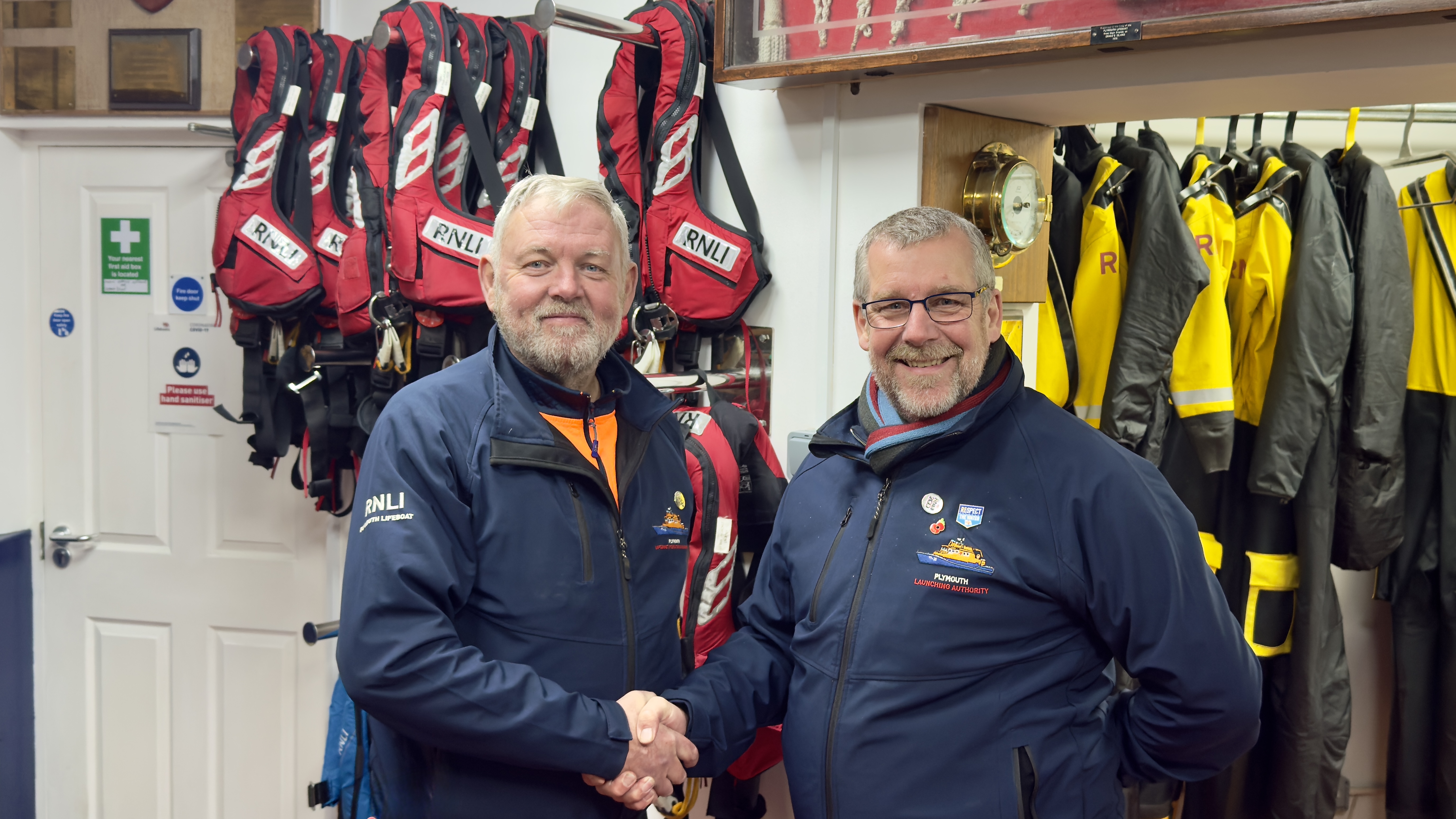 (L-R) Chris Westall hands over to Nigel Gray