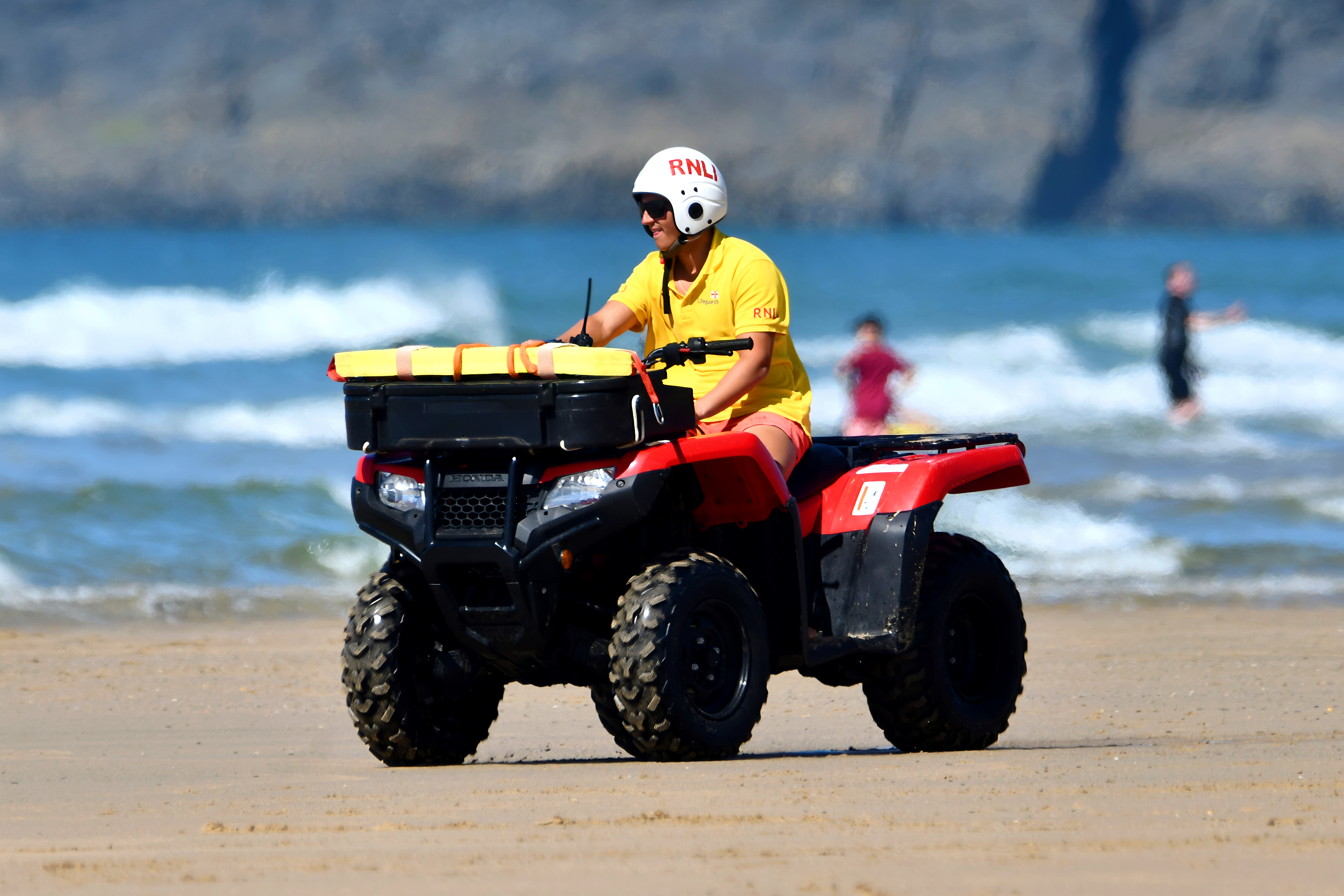 Lifeguard on a quad bike
