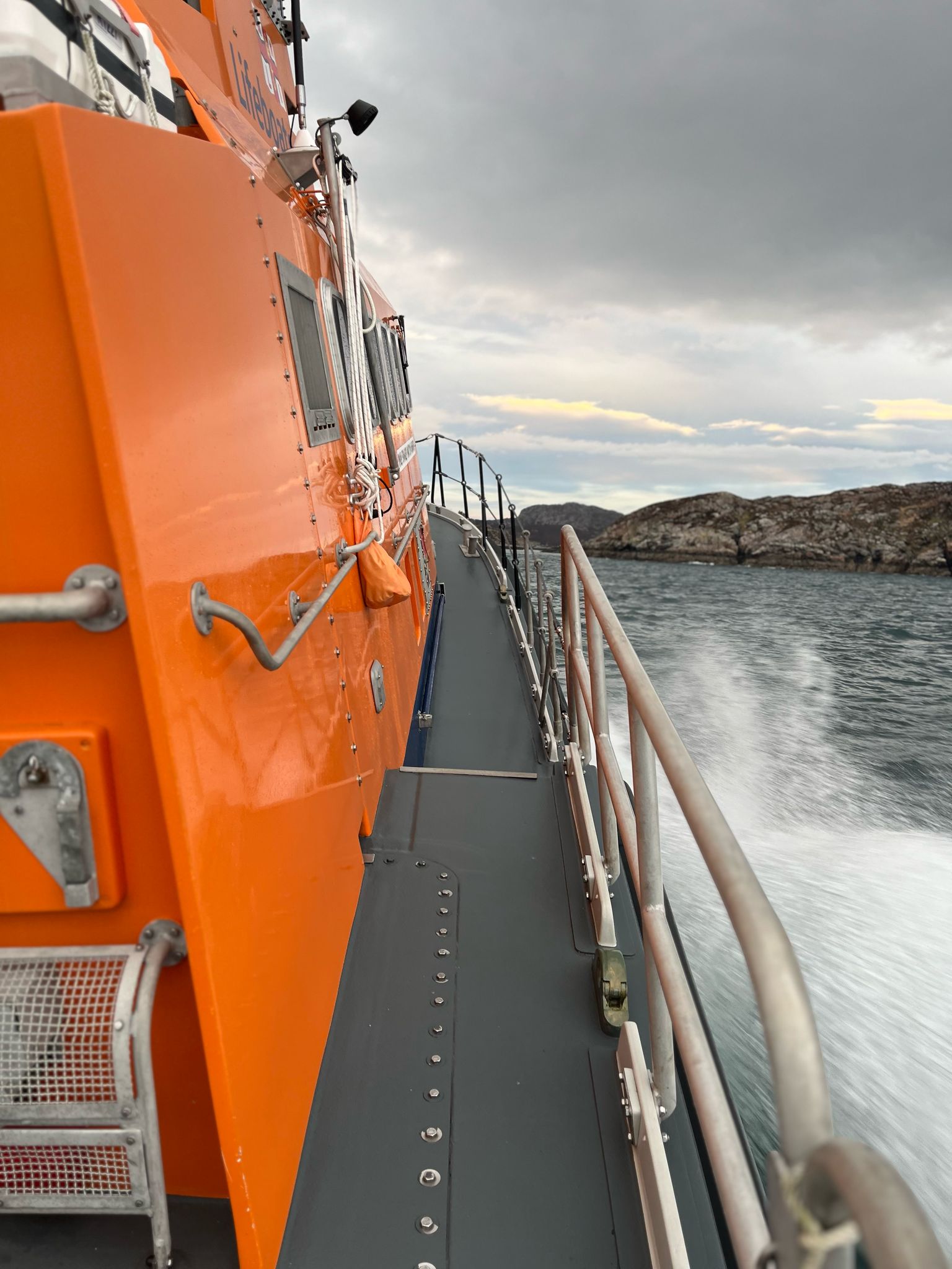 A view of Portree lifeboat making best speed towards the island of Rona.