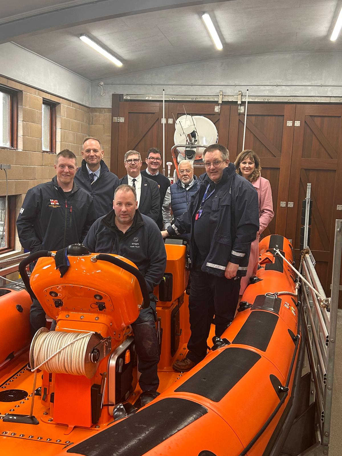 L-R Chris Beale, Lord Simon Stevens, Gareth Whan, Kevin Baird, Tom Bell, Bryan Lawther, Captain Byron Griffiths, Virginia McVea