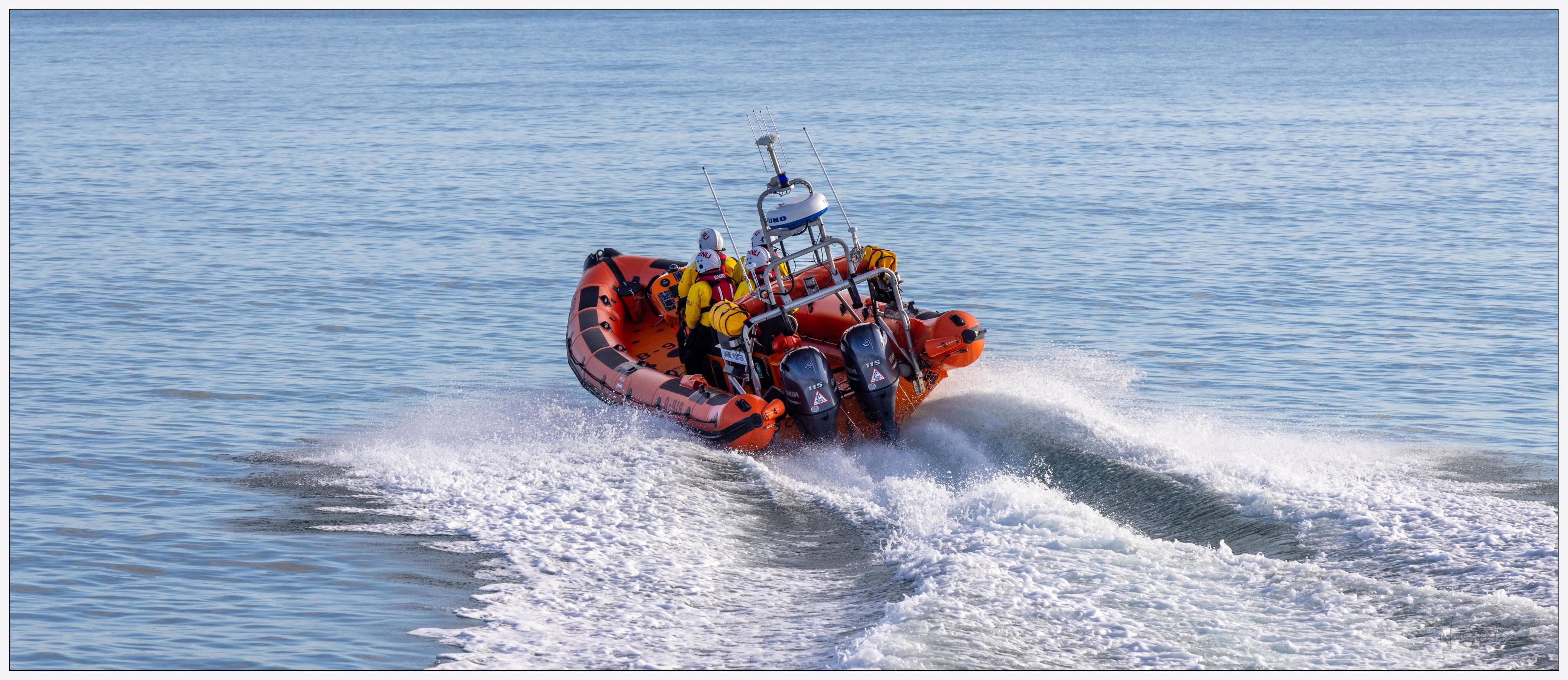 Stonehaven RNLI Atlantic 85 orange rib the Jamie Hunter travelling away