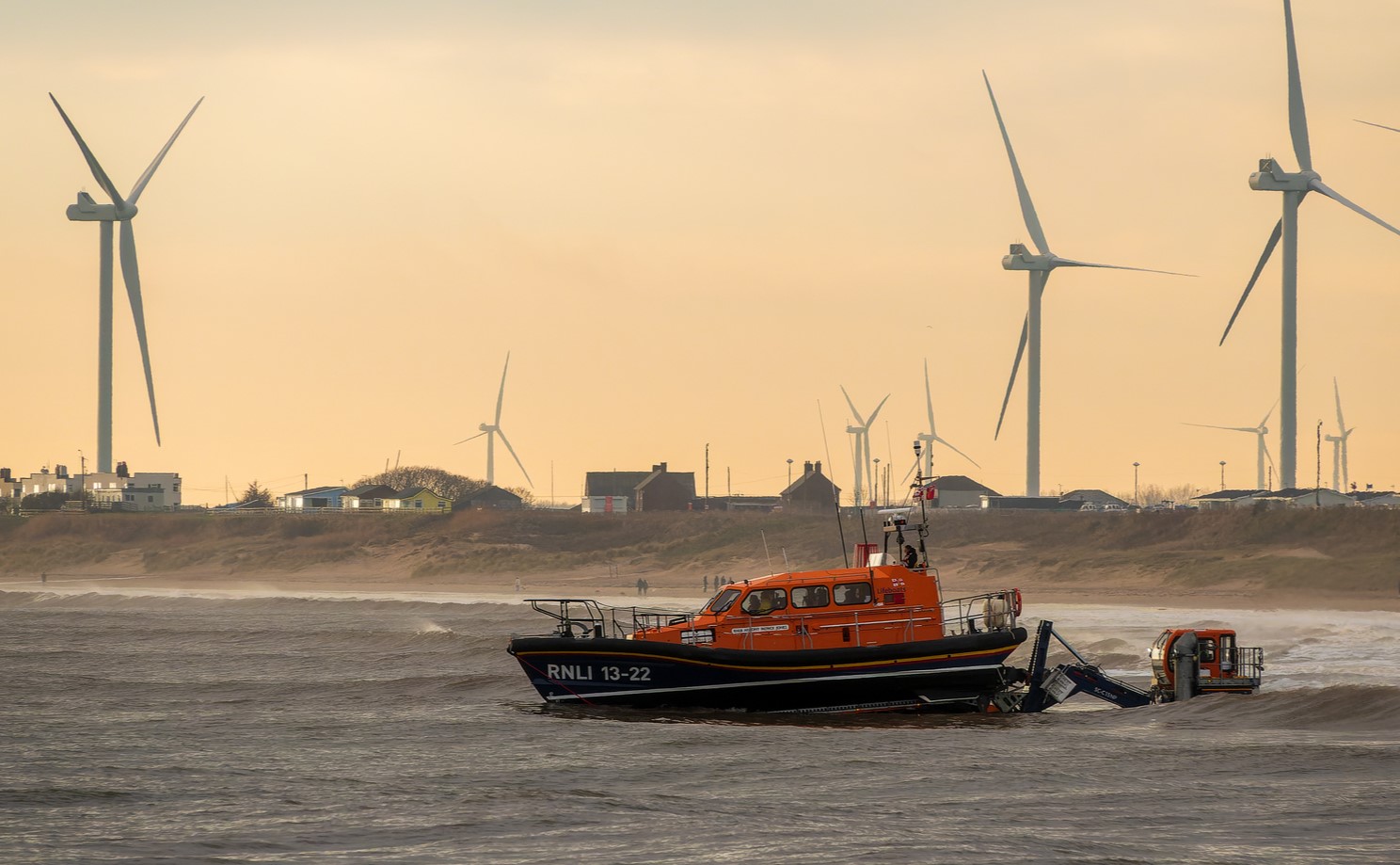 Bridlington RNLI volunteers launching after tasking to fishing boat.