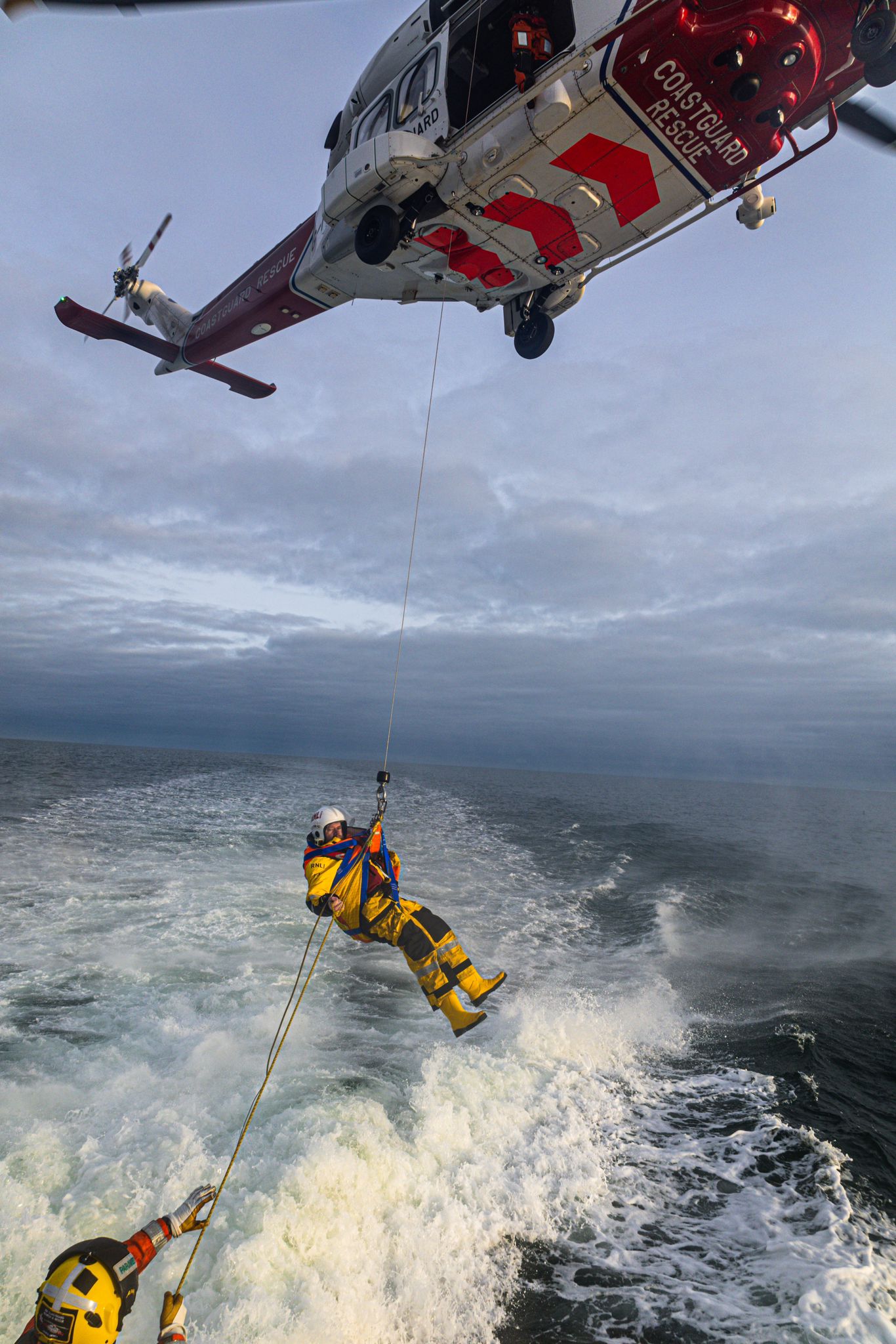 Person dangling in air.