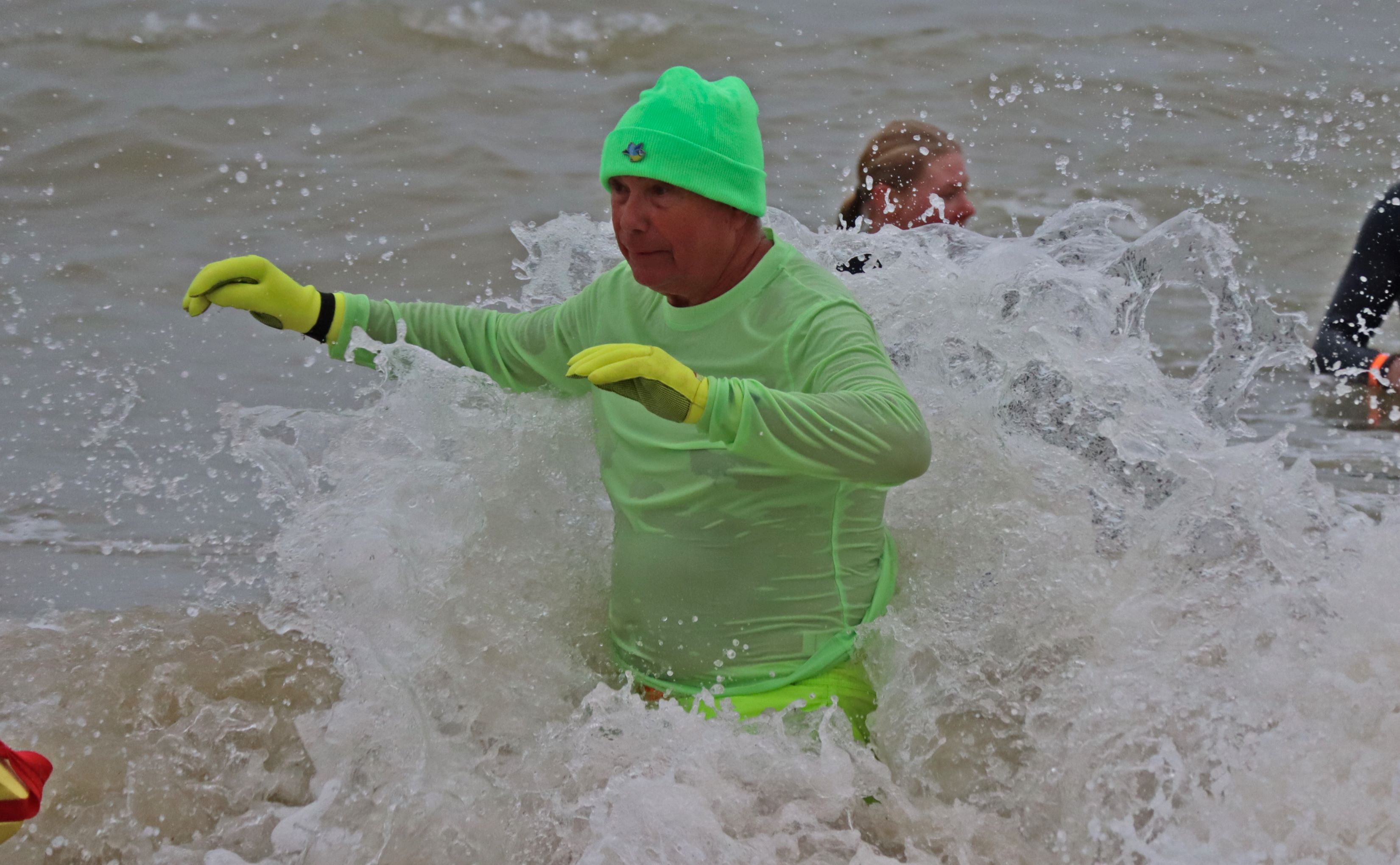 Many participants braved braking waves whilst in the water.