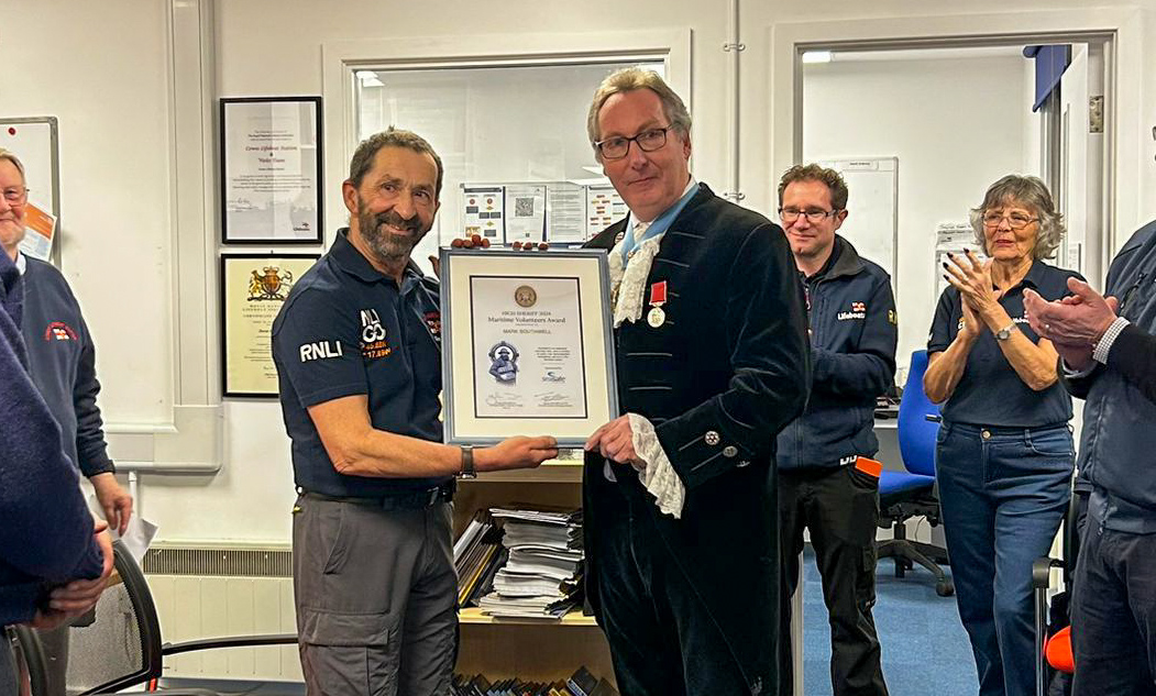 Mark and the High Sheriff, Graham Bliss, holding the award