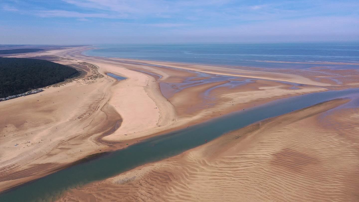 Sandbars at low water Wells/Holkham beach. Sand bars and channel of water with sea in background
