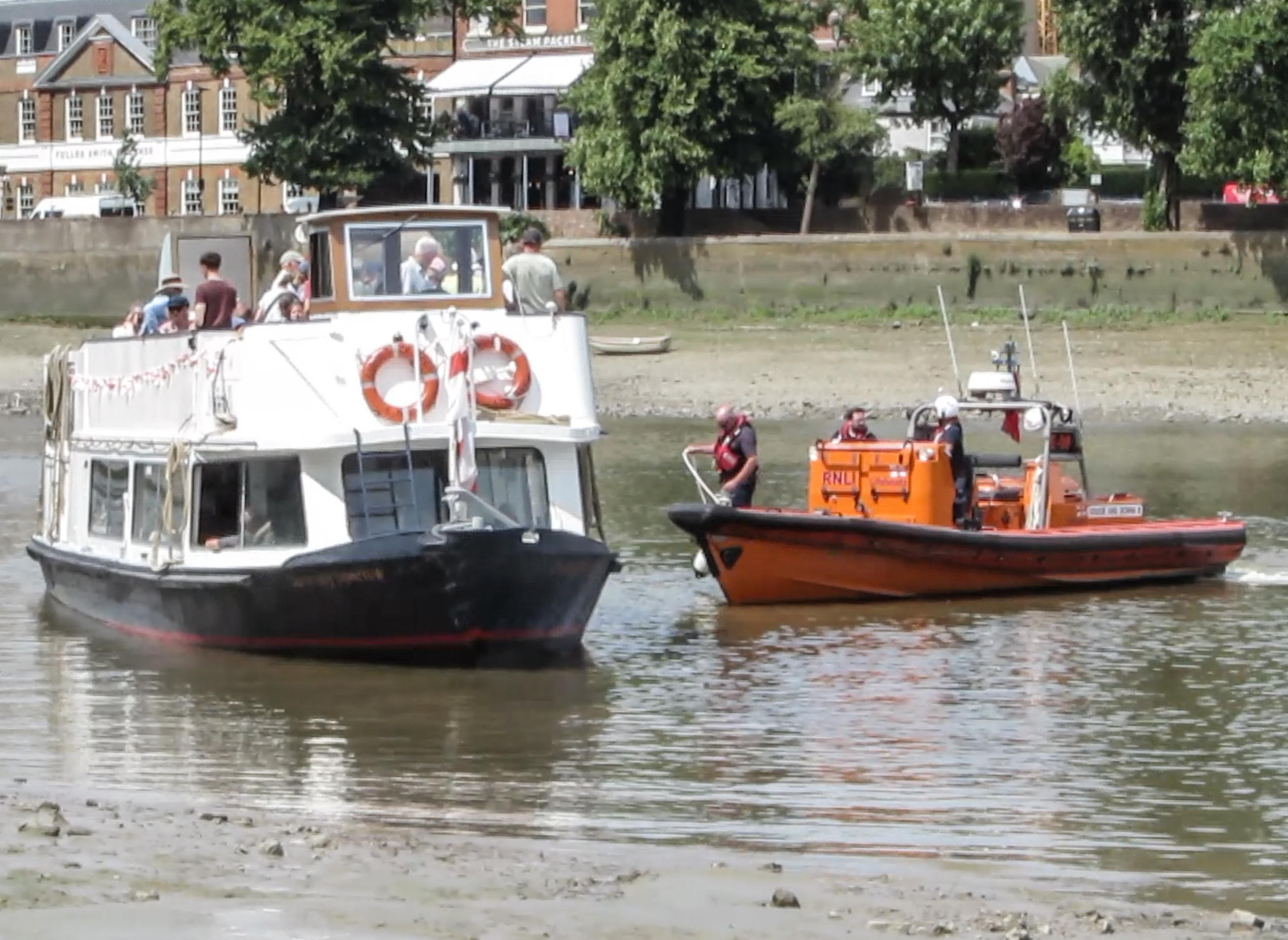 Lifeboat crew prepare to come alongside