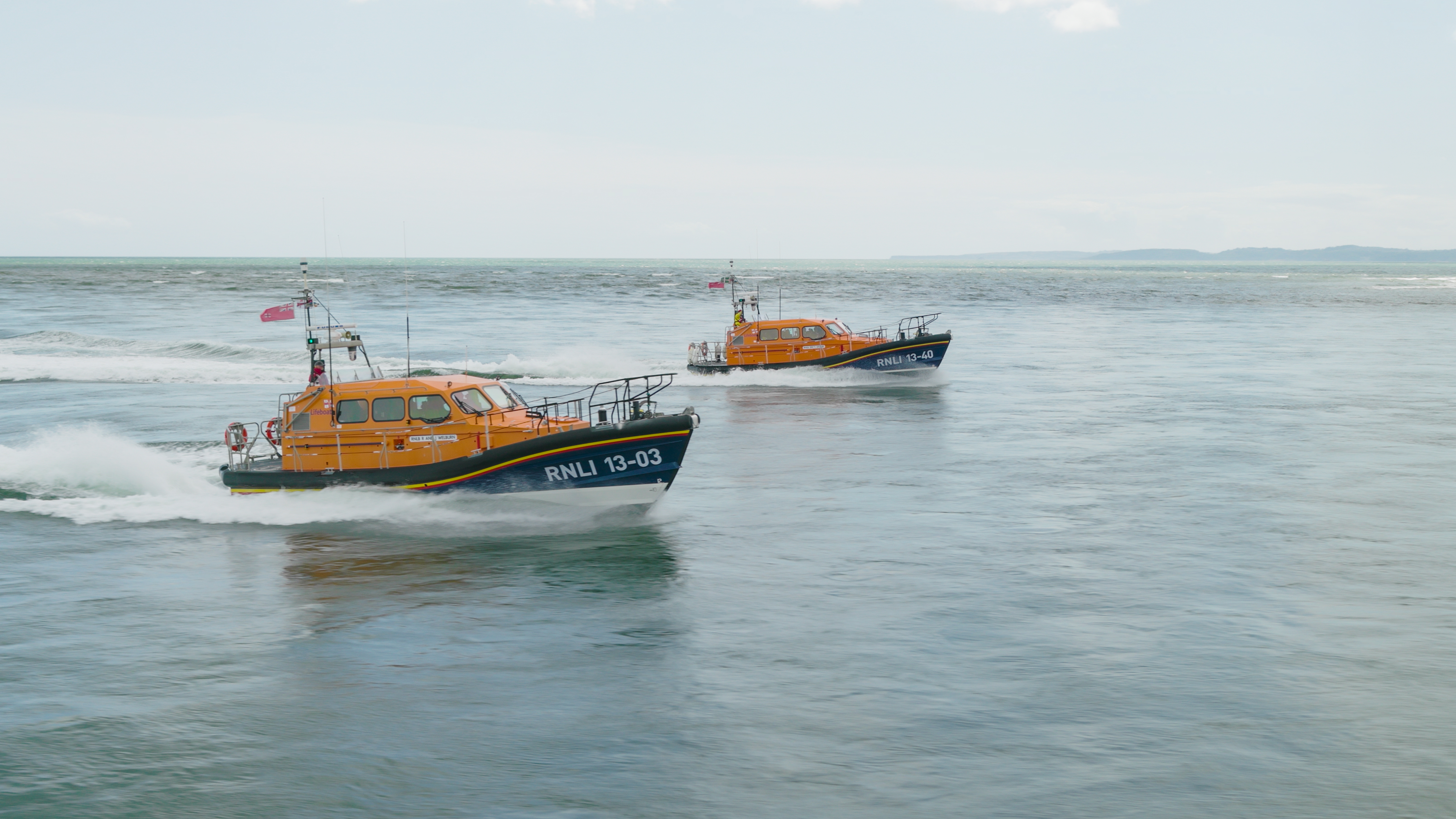 Launch a Memory lifeboat 13-03 R and J Welburn accompanied by 13-40 Eric's Legend on its return to Exmouth