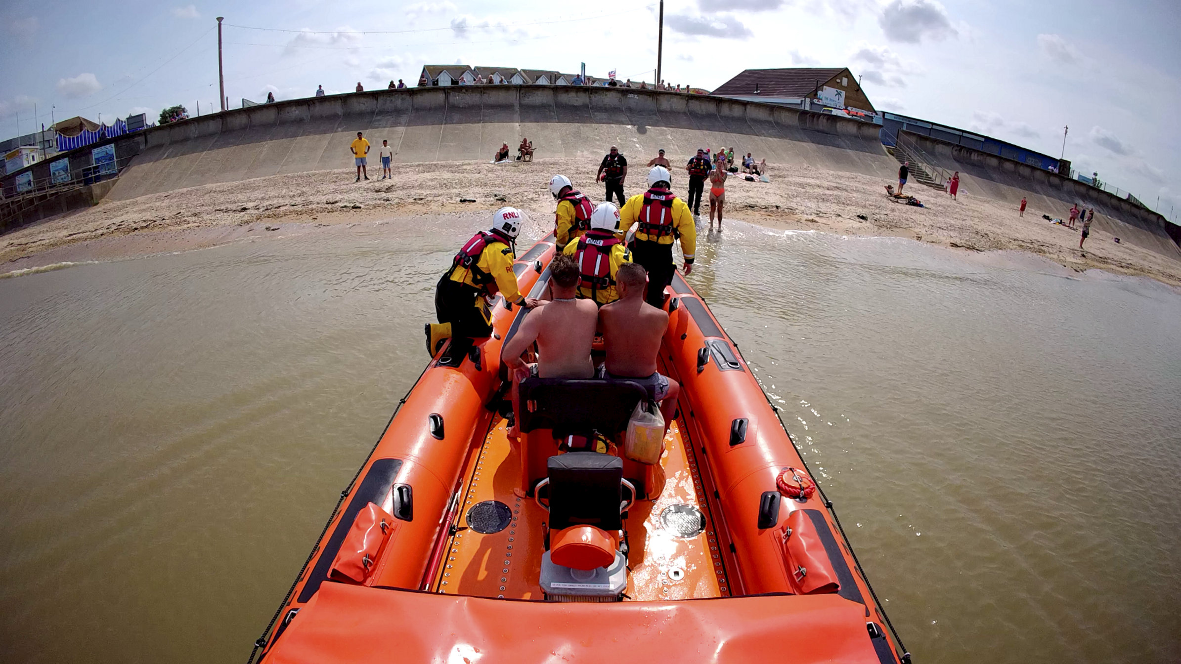 The two paddleboarders are landed back onshore after rescue by the Whitstable lifeboat.