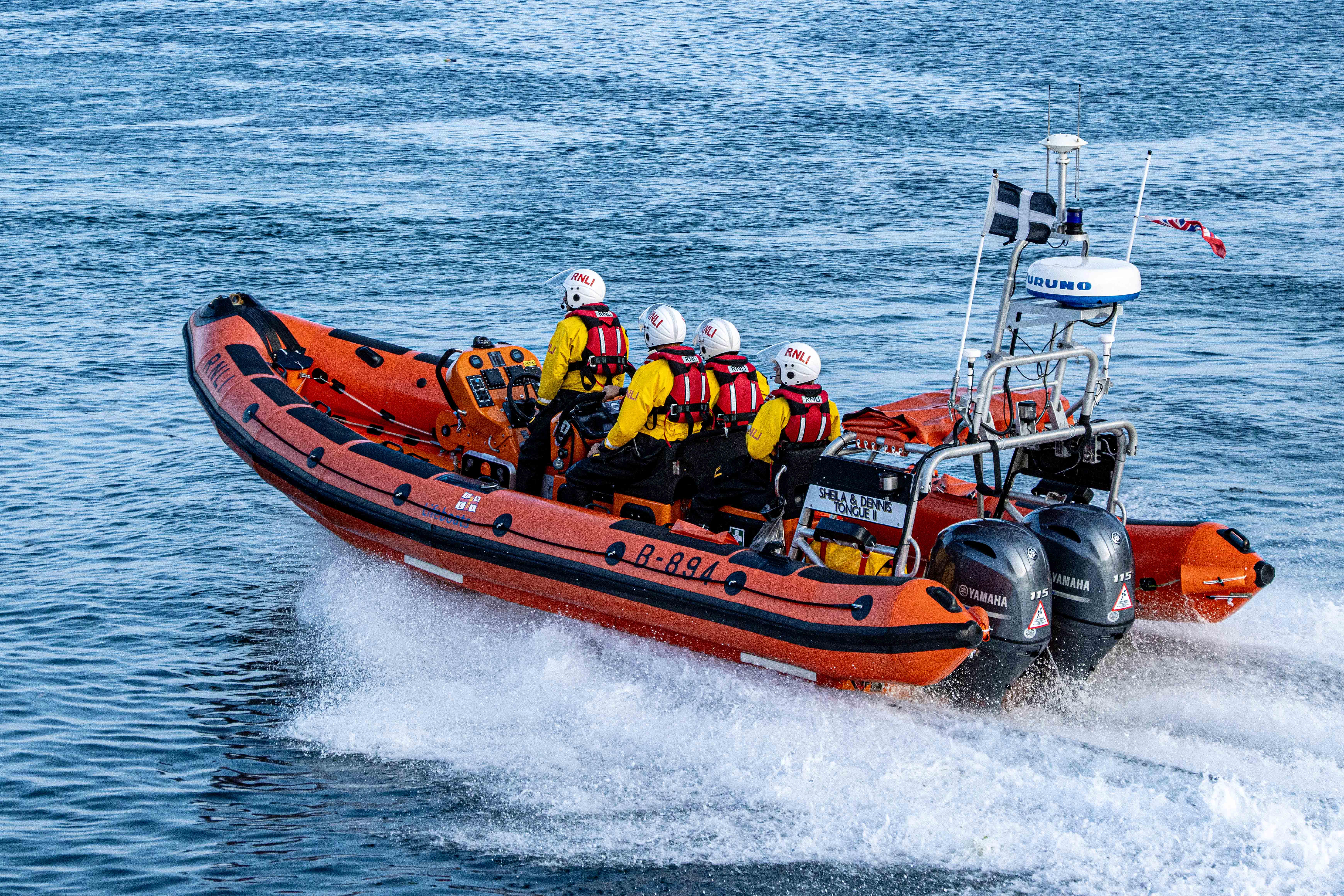 Stock image Looe RNLI Atlantic 85 Sheila and Dennis Tongue II heading out into Looe bay
