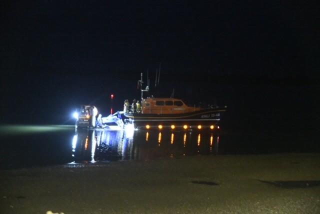 Wells RNLi Shannon class lifeboat call out in dark being recovered by SLARS 