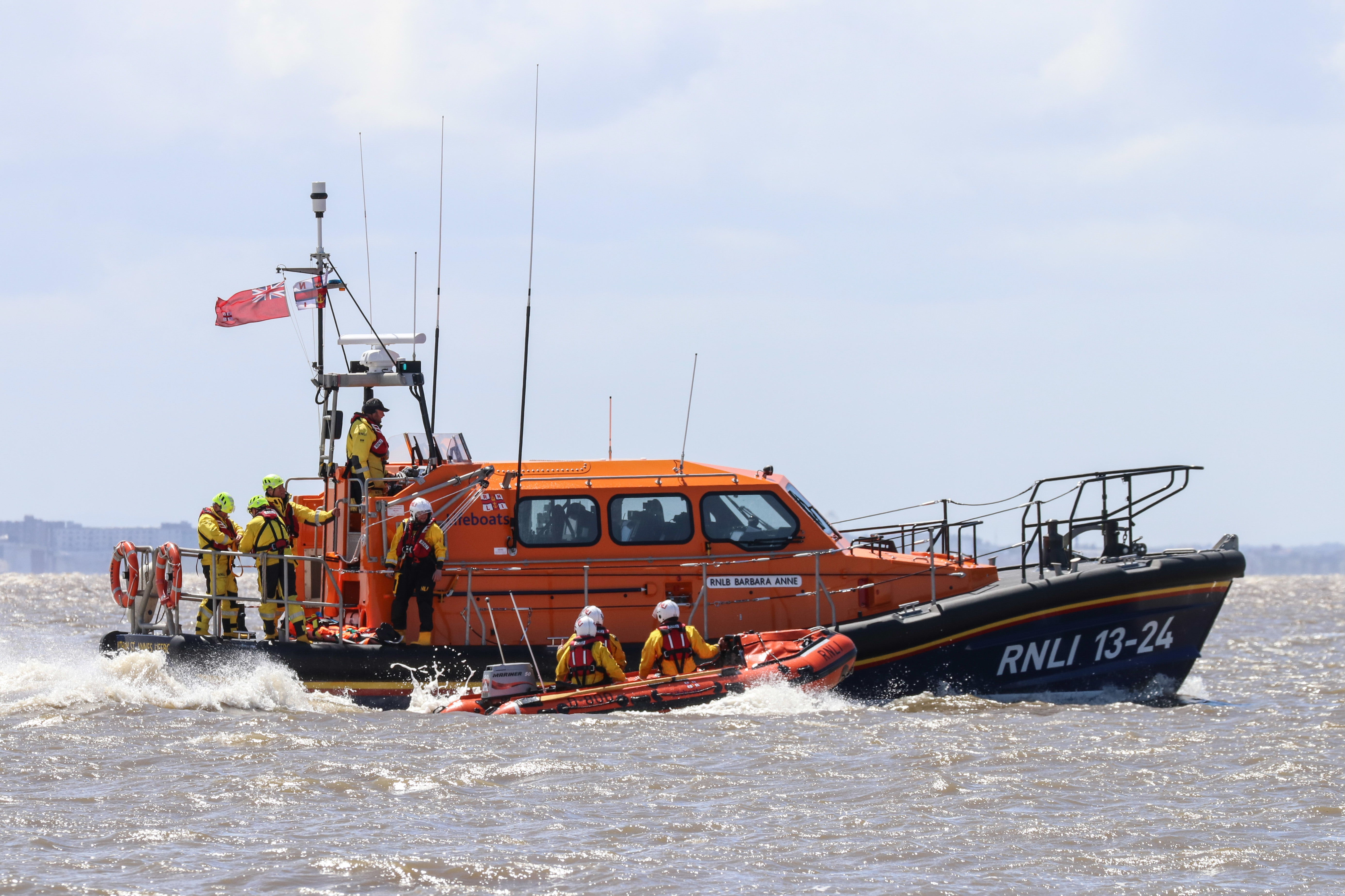 two lifeboats run alongside each other