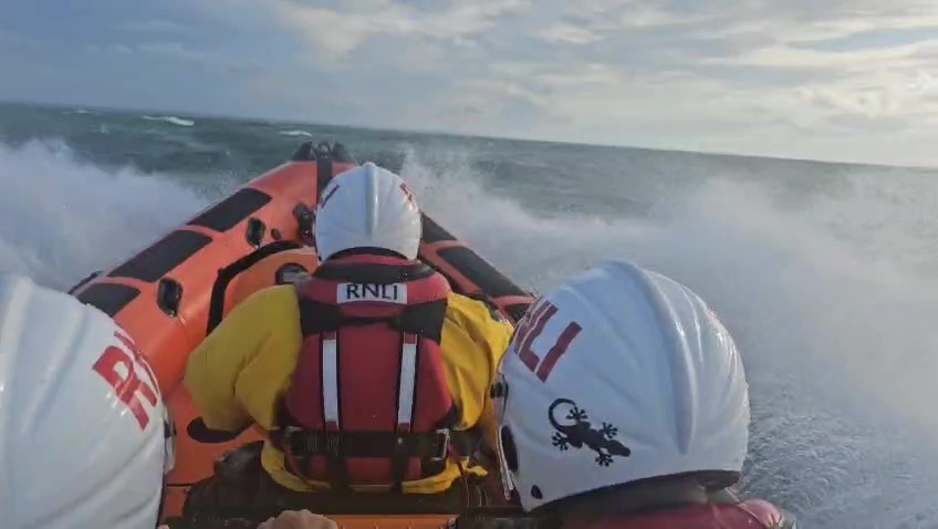 B-885 in choppy seas returning from broken down vessel 