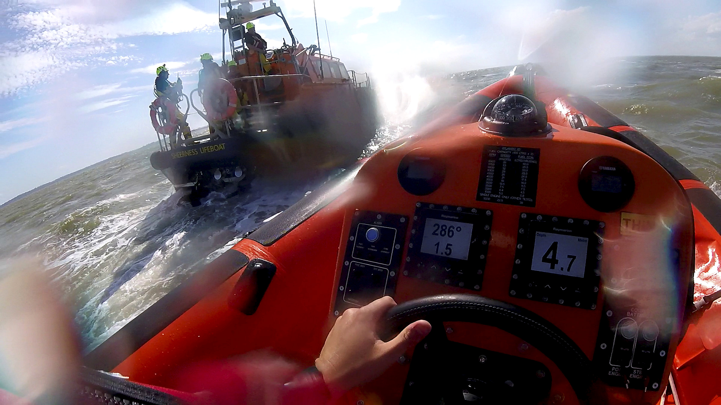 The Whitstable B-Class lifeboat approaches the Sheerness all-weather lifeboat during the incident involving a motor cruiser with engine problems on Tuesday afternoon.
