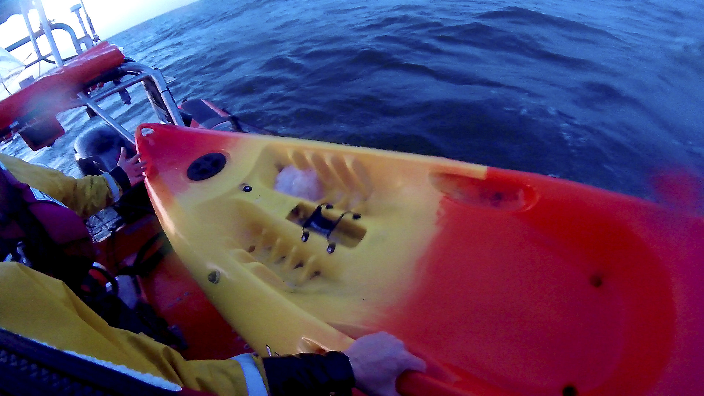 The drifting kayak is brought onboard Whitstable lifeboat.