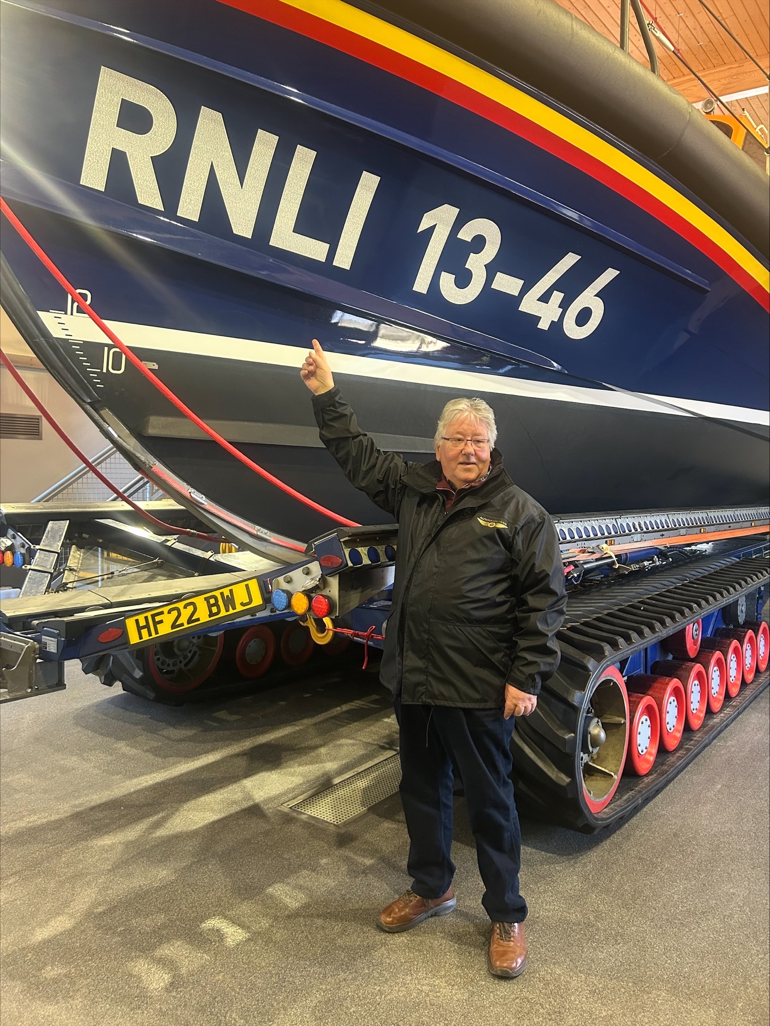 Rob Arnold points to his mothers name on 13-46 Shannon Class lifeboat