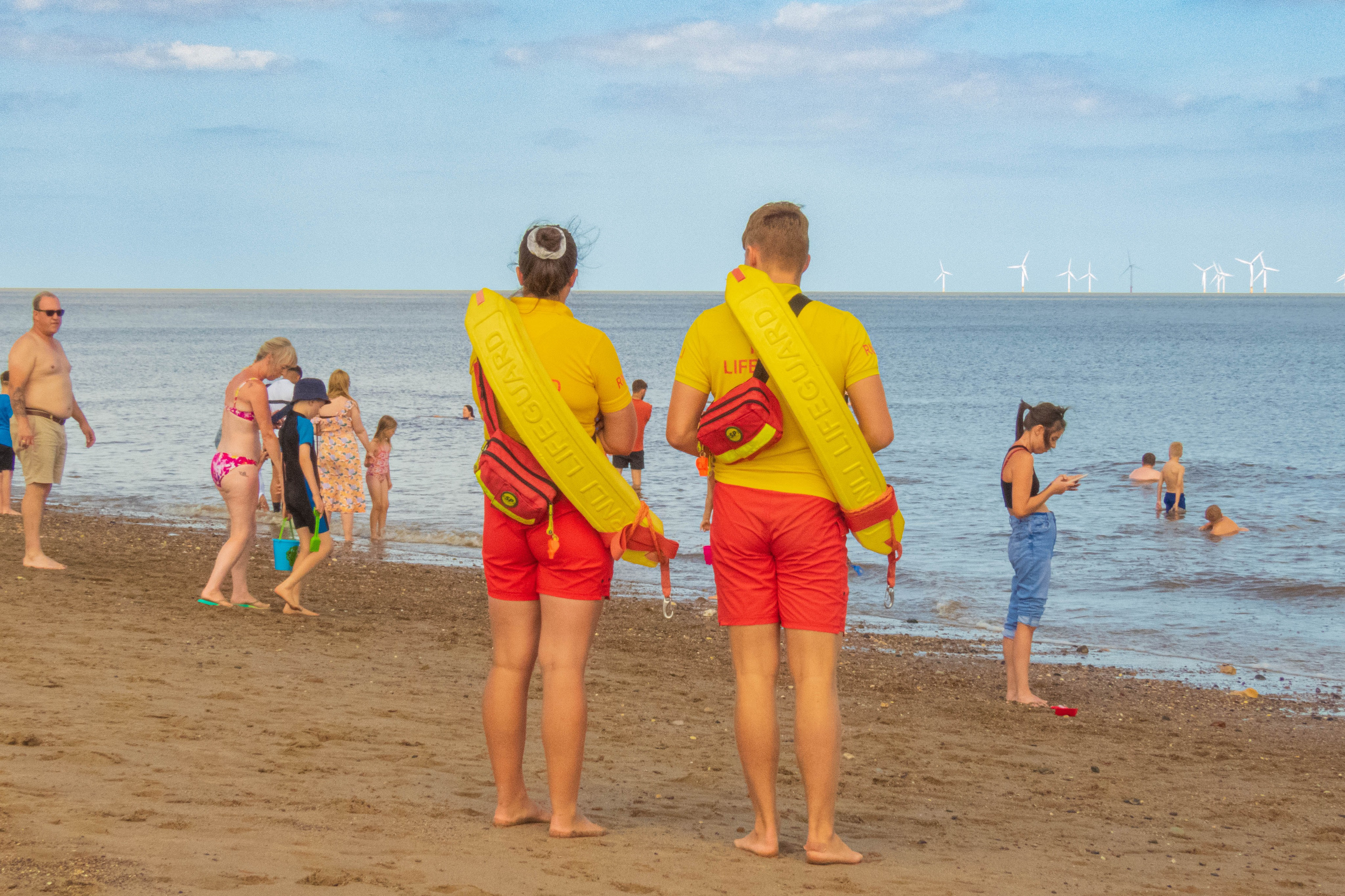 RNLI Lifeguards patrolling during busy summer season in Skegness 