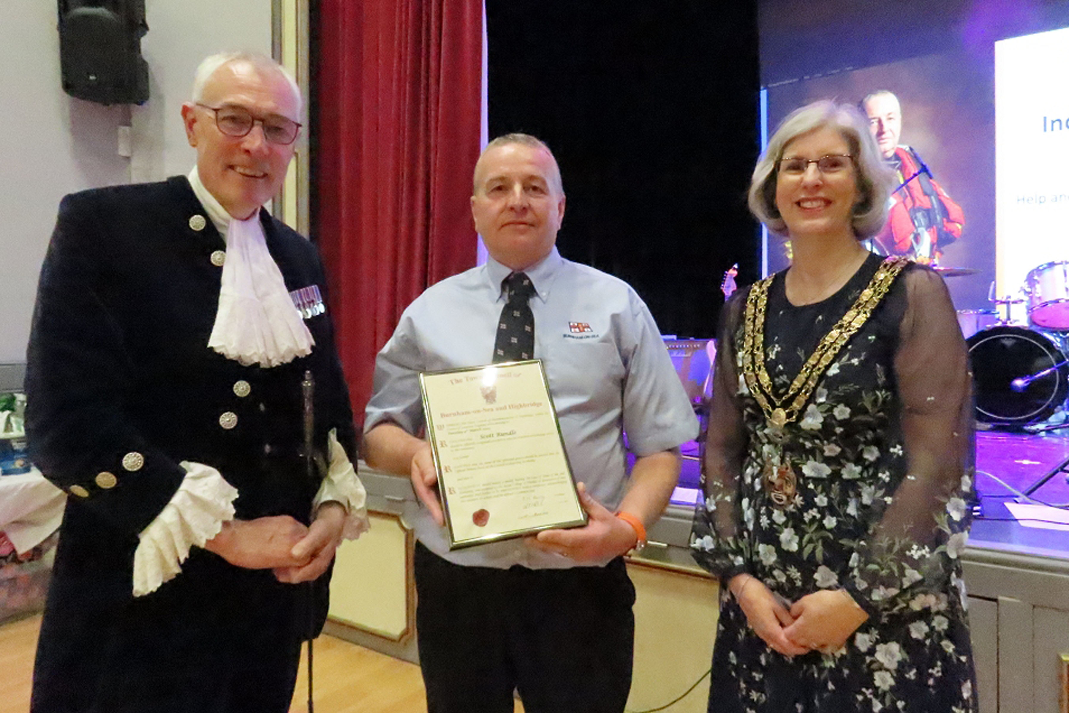 Scot receives his award from Mayor Cllr Sharon Perry and Somerset High Sheriff Rob Beckley