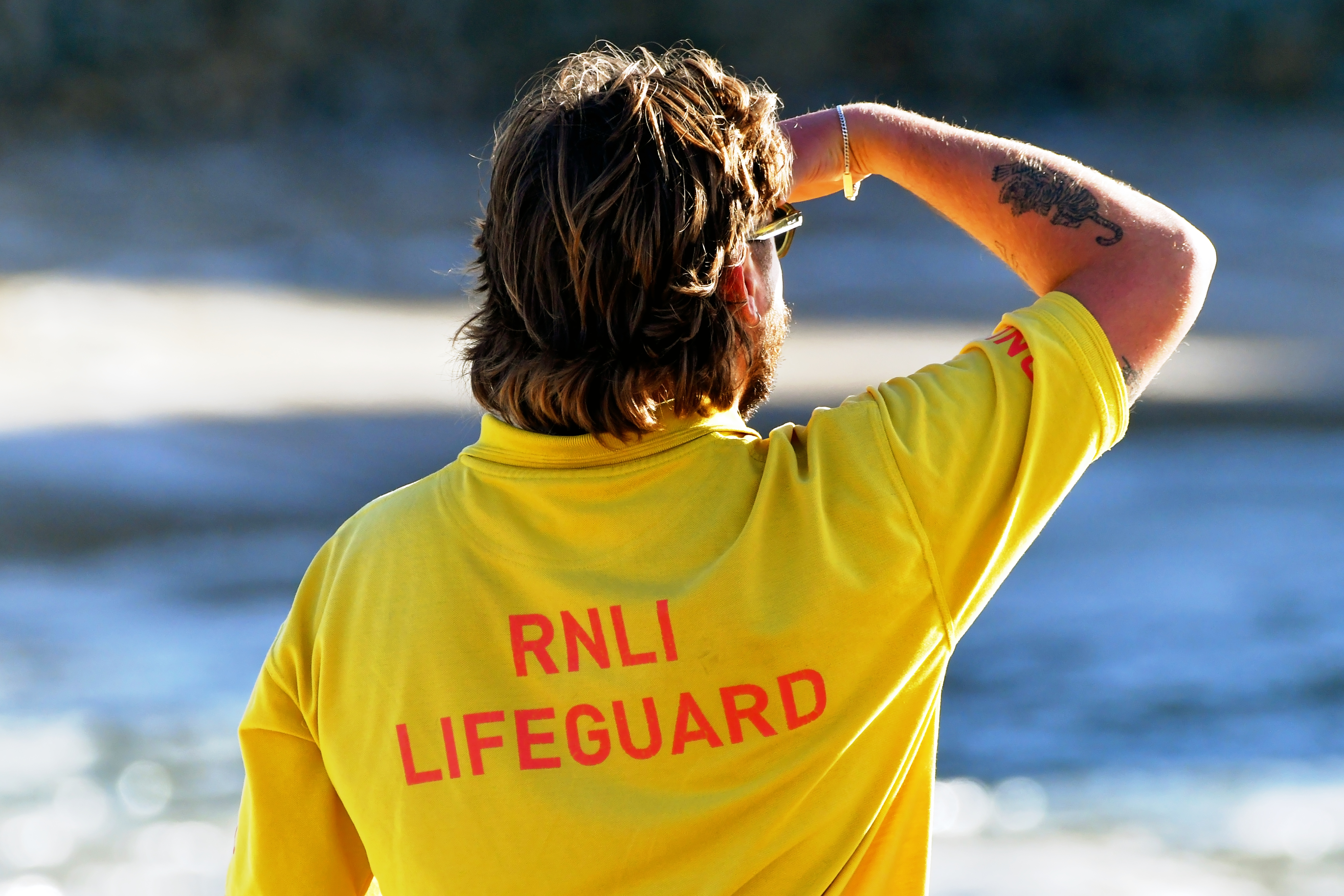 Lifeguard looking over the beach