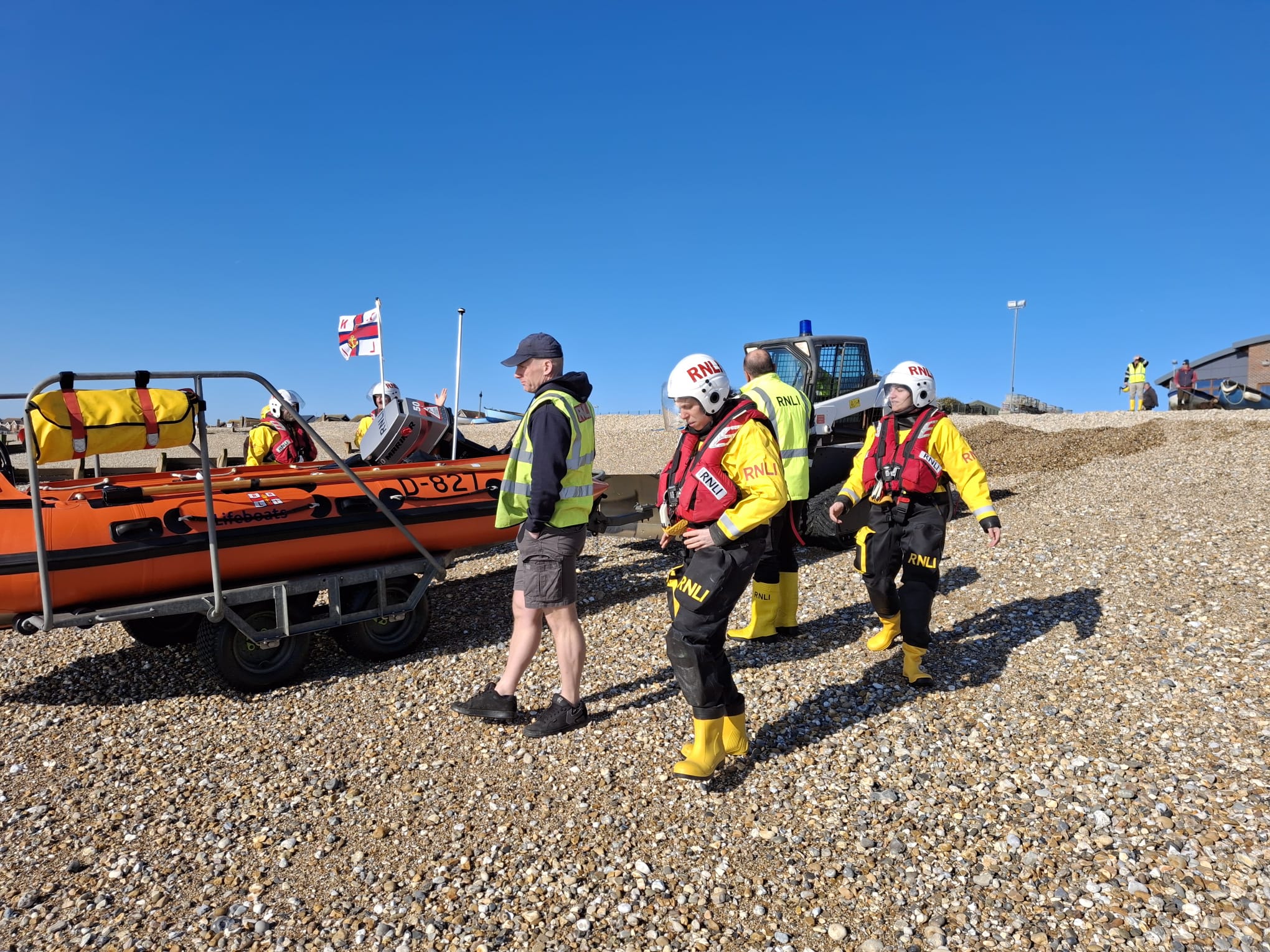 Crew members preparing to launch the D class from the beach