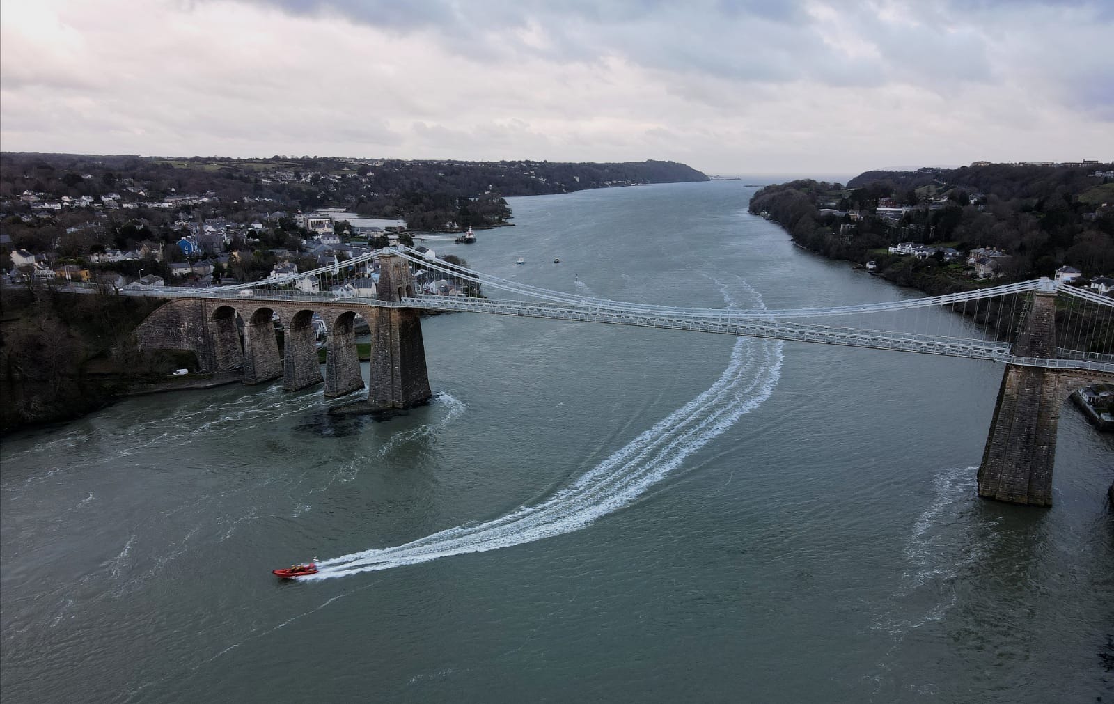 Beaumaris Atlantic 85 lifeboat passing under the Menai Bridge